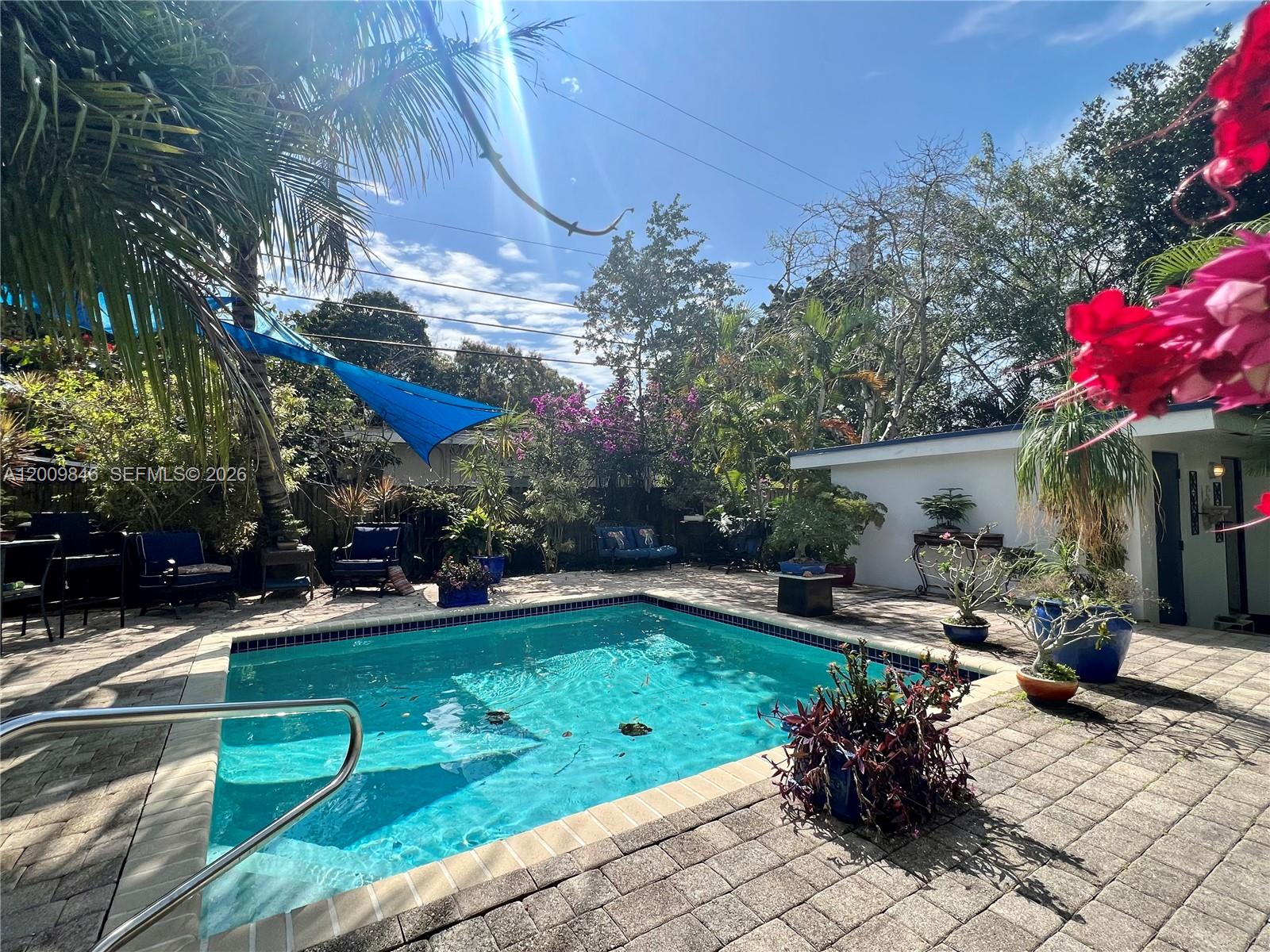 AMAZING OPPORTUNITY RARE! Beautiful 1-bedroom unit in the desirable community called Astra in Oakland Park. Ground-floor residence featuring grey flooring throughout, a renovated kitchen, and new A/C units. Enjoy both front and back private patios, ideal for relaxing or entertaining. Gated, very secure community with pool, lush landscaping, and a peaceful, zen-like atmosphere highlighted by bonsais and well-maintained plants. Quiet setting, perfect for end-users or investors, great investment opportunity!! Low maintenance and no assessments!! Call today