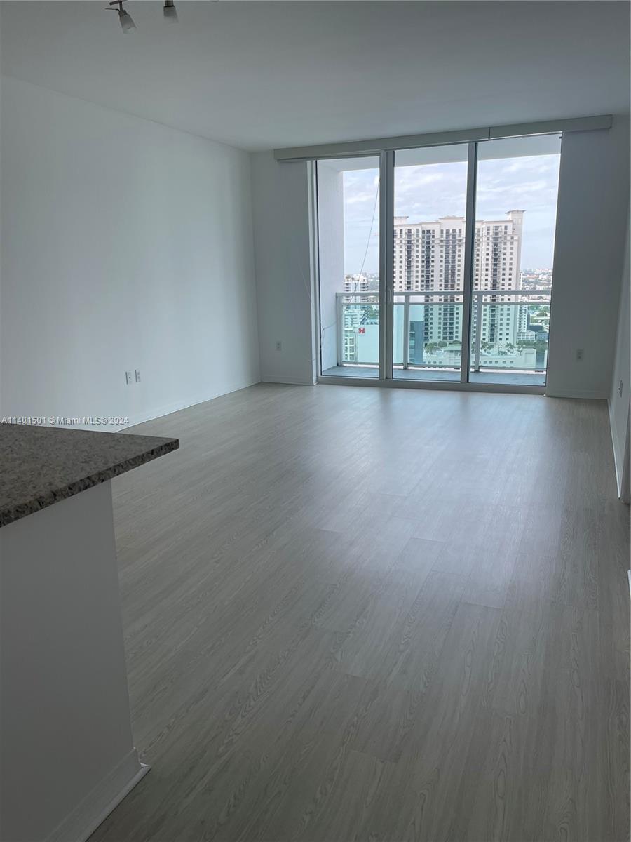 Outstanding Unit at The Plaza on Brickell. This one-bedroom, one-bathroom residence offers breathtaking city views from the 28th floor. The Italian-style kitchen features wood cabinets, granite countertops, and stainless-steel appliances, as well as a washer and dryer. The building is replete with fantastic amenities, including a beautiful pool area with a jacuzzi, a well-equipped gym, a game room, a business center, a theater, valet parking, and 24-hour security with lobby attendance. Ideally situated in the heart of Brickell, this property is within walking distance of renowned restaurants, bars, and shopping destinations. "THE CARPET IS BEING REPLACED WITH VINYL FLOORING"