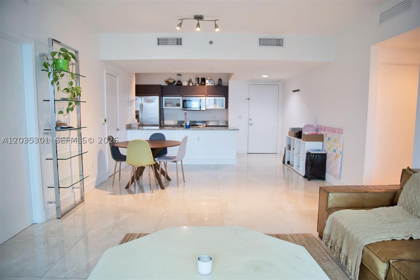 THE PLAZA 901 BRICKELL CO - Residential Lease