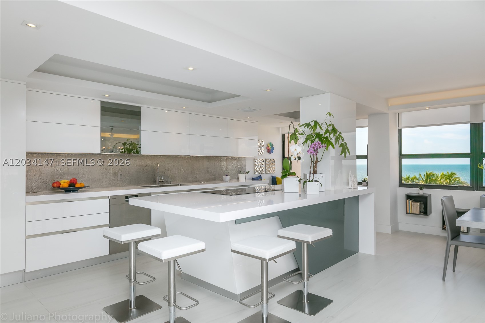 COCONUT GROVE private Island "GROVE ISLE"OFFERS UNOBSTRUCTED DIRECT OCEAN AND BAY VIEW FROM ITS TWO OPEN BALCONY!!! FULLY RENOVATED. Located on the 5th floor, this apartment offers enough height and elevation to admire the beautiful green landscaping and to listen to the sounds of the ocean's calming waves from the balcony. Brand New Tennis Club with 8 tennis courts.