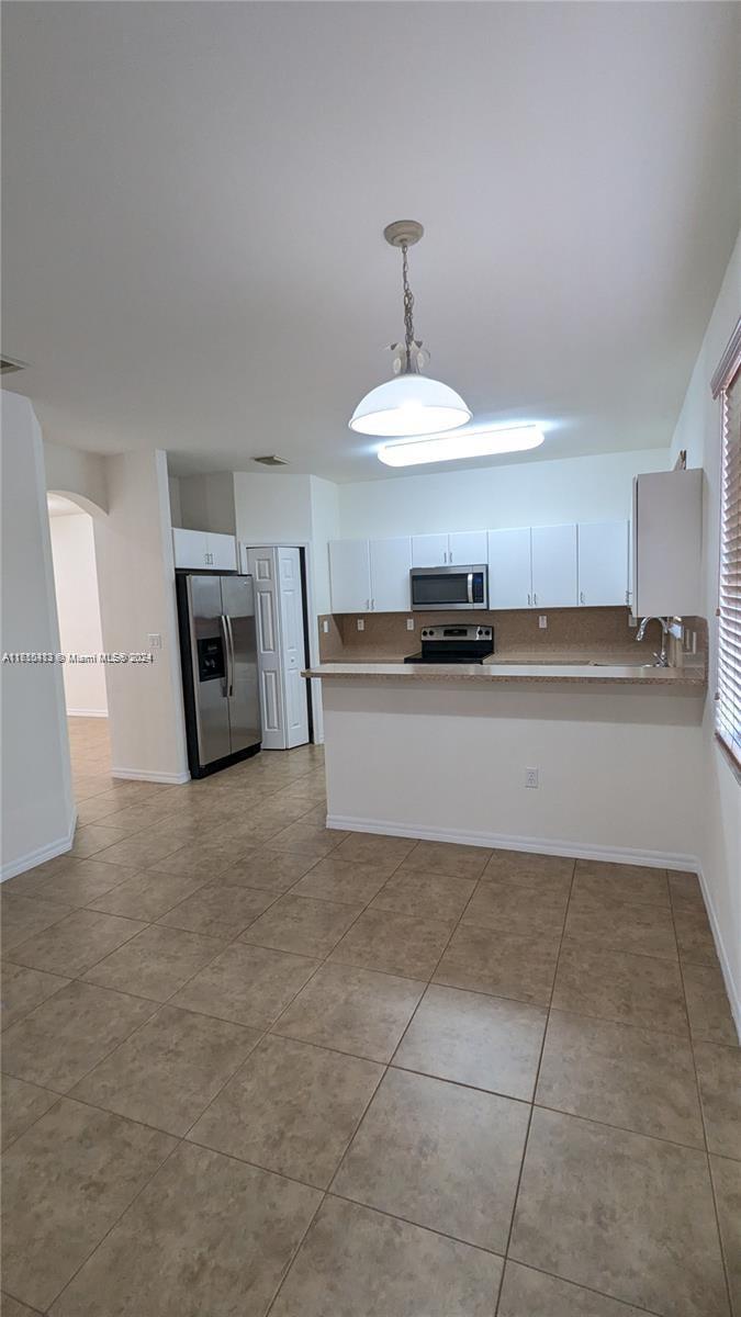 CENTURY GARDENS AT TAMIAM - Residential