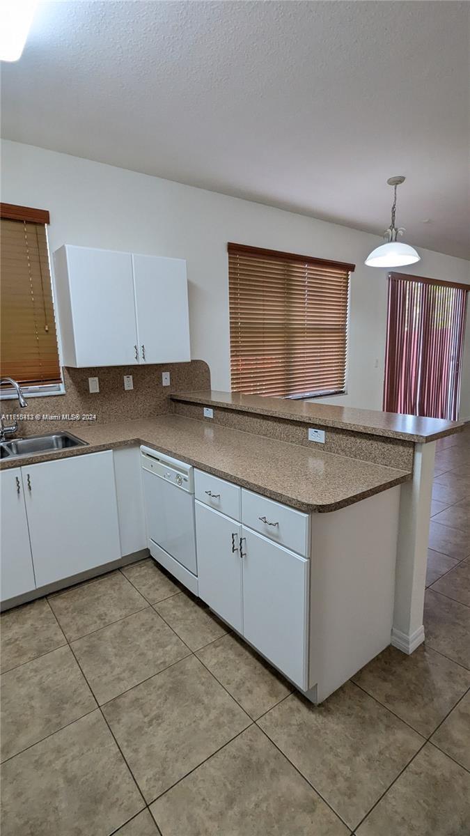 CENTURY GARDENS AT TAMIAM - Residential