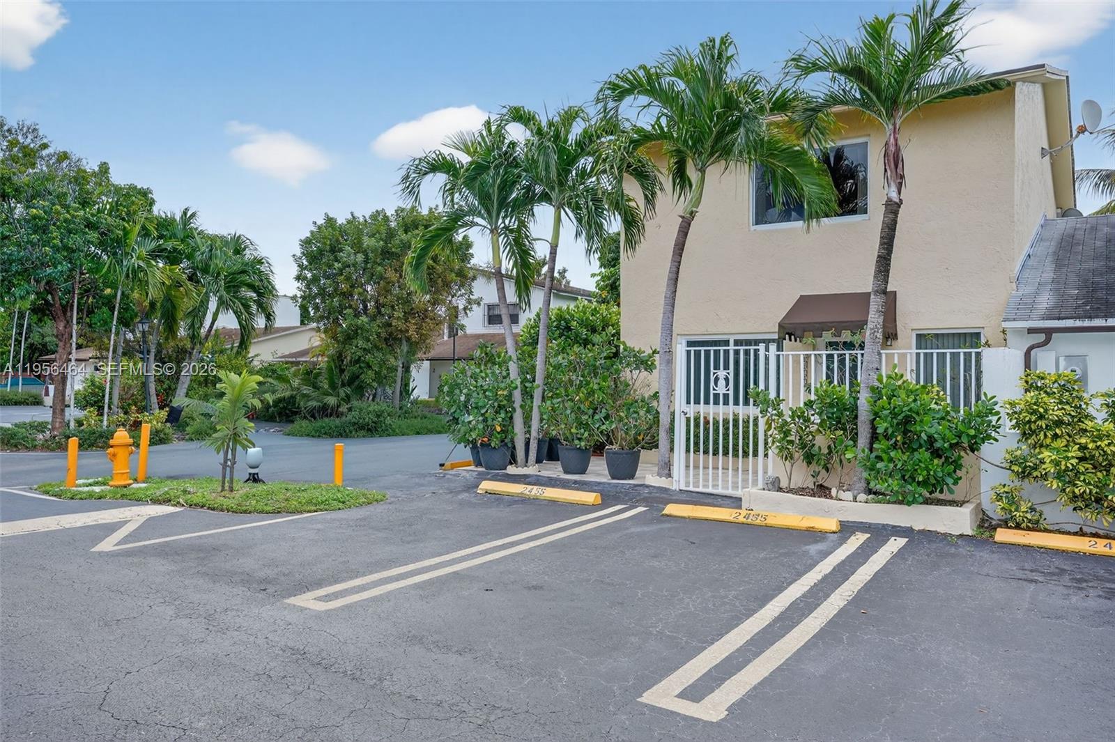 3 Bedrooms and  3 .5 BATHS Amazing  home located in the desirable Miami Shenandoah district, just a few blocks from Calle Ocho / SW 8th Street and Miami Dade College, making this a prime location to live, work, and play. This two-story residence offers 3 bedrooms and 3.5 bathrooms, featuring a spacious living area and a full bedroom and bathroom downstairs with private entrance for in-laws / teenagers or even extra income , ideal for guests, extended family, or rental income. The upper level includes two large bedrooms with two full bathrooms, a washer and dryer room, and a generously sized kitchen. Situated within a very private, gated, and secured community surrounded by mature trees, this home offers a truly peaceful and magical setting. Additional features include impact windows, two assigned parking spaces, very low maintenance fees, and low taxes. Easy to show, call listing agent for more information.