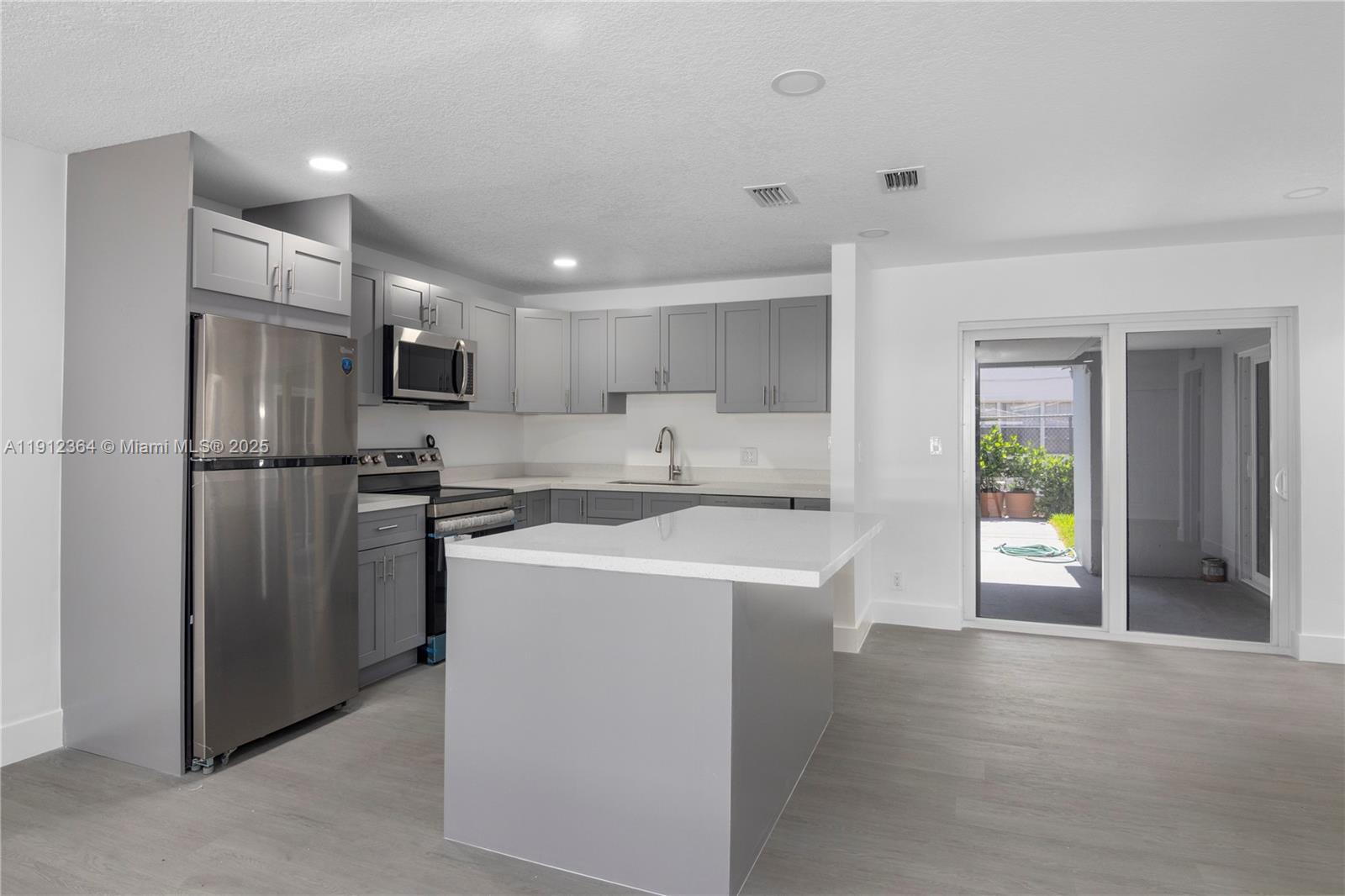 Fully Renovated! New Roof, New Kitchens, New Bathrooms, New Hurricane Impact Windows & Sliding Doors. New Appl., new waterproof laminate floors, new 6 car cir. driveway, new interior & exterior paint. Each unit has own its own carports, own washer/dryer & private covered patios. Great location near Ft. Lauderdale Beach and US-1 / Federal Hwy. Ideal property for ABNB. Vacant! 2/2 can rent for $3,200, 1/1 can rent for $1,900 annual rents. High income potential. Completely renovated! Owner is motivated to sell fast. Bring all offers.