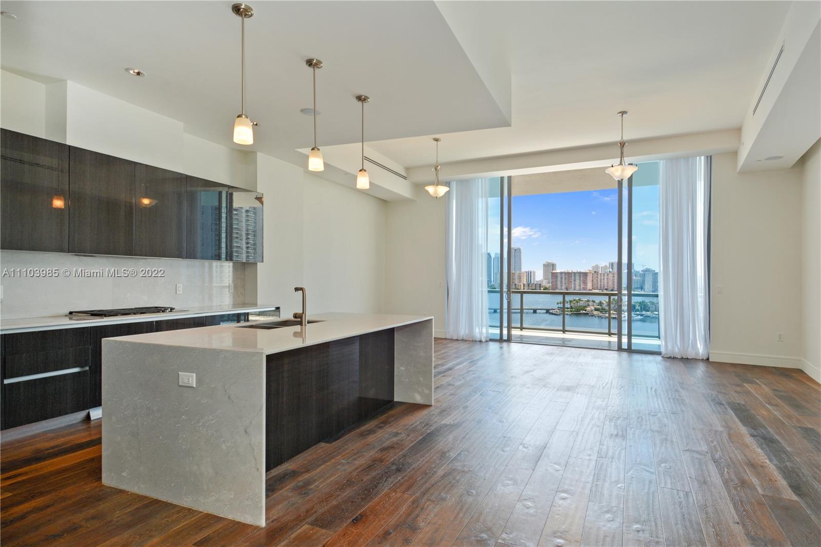 WOW! FABULOUS ECHO AVENTURA UPPER PENTHOUSE W/ ROOFTOP POOL! PRIME LINE W/ THE MOST EXQUISITE DIRECT INTRACOASTAL + OCEAN + CITY VIEWS TO TAKE YOUR BREATH AWAY. ENTER THIS NEW 2015 SPECTACULAR RESIDENCE FROM PRIVATE ELEVATOR FOYER. THIS 3 BEDROOM + SERVICE SUITE HAS SMART HOME SYSTEM TECHNOLOGY & OFFERS CUTTING EDGE LUXURY FINISHES. OPEN STATE OF THE ART GOURMET KITCHEN W/ TOP OF THE LINE APPLIANCES SUB ZERO GAS STOVE, EXTRA HIGH CEILINGS, LOTS OF FLOOR TO CEILING GLASS, OVERSIZED BALCONY W/ SUMMER KITCHEN & ROOFTOP TERRACE W/ YOUR PRIVATE POOL. A RARE GEM! AMENITIES INCLUDE BAYFRONT INFINITY-EDGE POOL W/ OCEAN VIEWS, PRIVATE BEACH CLUB, CHOOSE FROM "RESORT PASS", STATE-OF-THE-ART FITNESS CENTER, BRAND NEW PLAYGROUND, POOL TABLE, GAMES, SUPERMARKET (SCAN BY SELF), BBQ AREA, MASSAGE ROOM.