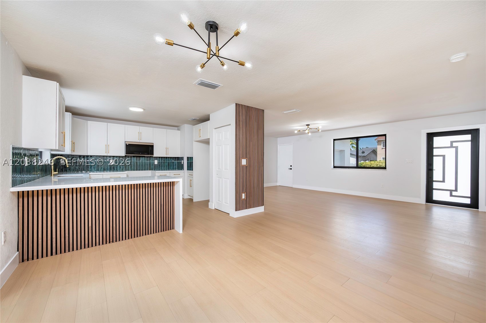 Beautifully remodeled 4-bedroom, 2-bathroom move-in ready home featuring insurance-friendly upgrades, including a brand-new roof, impact windows, and impact doors for added safety and peace of mind. The stunning kitchen boasts quartz countertops, new appliances, and modern finishes throughout. Both bathrooms have been tastefully renovated with elegant details and quality craftsmanship. No expense was spared in the renovation, with thoughtful updates and fine finishes designed to impress today’s buyers. The spacious backyard offers plenty of room to add a pool and create your own private outdoor oasis. Every aspect of this home has been carefully updated and maintained. NO HOA! Appraised at $667,000. Competitively priced for a quick sale—don’t miss this exceptional opportunity!