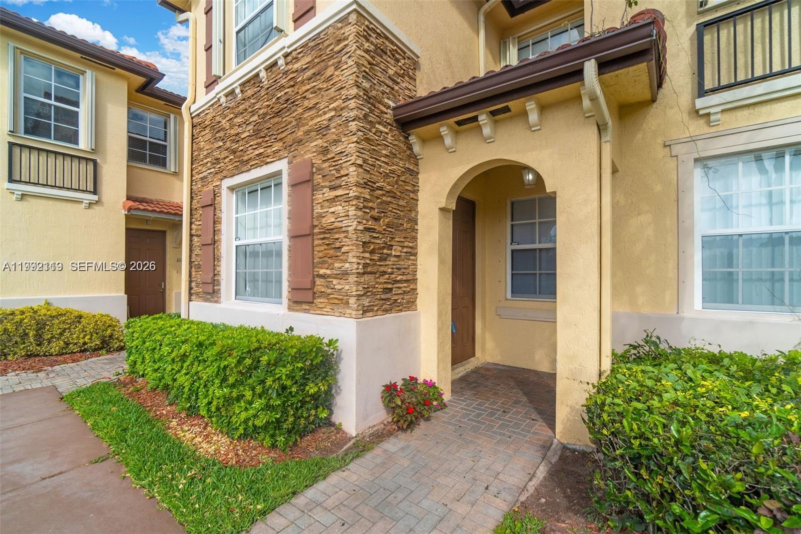 Step into this beautifully updated townhouse! Bright and open, this spacious 3-bedroom, 2.5-bath home features a contemporary kitchen and flowing living and family areas designed for modern comfort and easy entertaining. A must see!! 

Tile flooring enhances the main level, while low-maintenance laminate adds warmth upstairs. The well-planned layout includes a peaceful primary suite with a private en-suite bath, two additional bedrooms, a full bath on the second floor, and a convenient half bath downstairs.

Enjoy resort-style community amenities including a sparkling pool, clubhouse, fitness center, and scenic walking paths—perfect for an active, convenient lifestyle. A fantastic opportunity for both homeowners and investors.