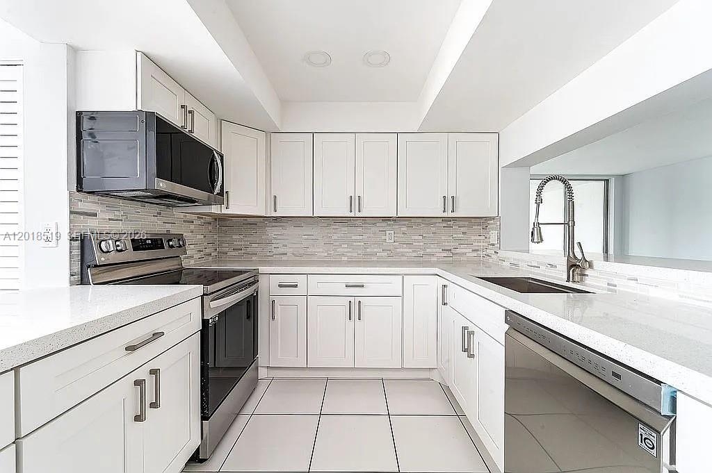 Come live a life of luxury at Sabal Palms, this fully updated 3-bedroom, 2-bath corner unit is located at the top floor of a luxurious resort-style community. Ideal for those seeking a turnkey property in a prime location, this unit is ready for you to move in and make it your own. NO RENTAL RESTRICTIONS! You'll immediately appreciate the open floor plan, designed to maximize space & natural light. The gourmet kitchen has been completely updated with sleek cabinetry, stainless steel appliances, and beautiful quartz countertops. The resort-style amenities include a sparkling pool, fitness center, clubhouse, & recreational areas. This is a pet-friendly community located next to A+ schools, local shopping and major highways. This property will be a perfect fit for a full-time residence or investment