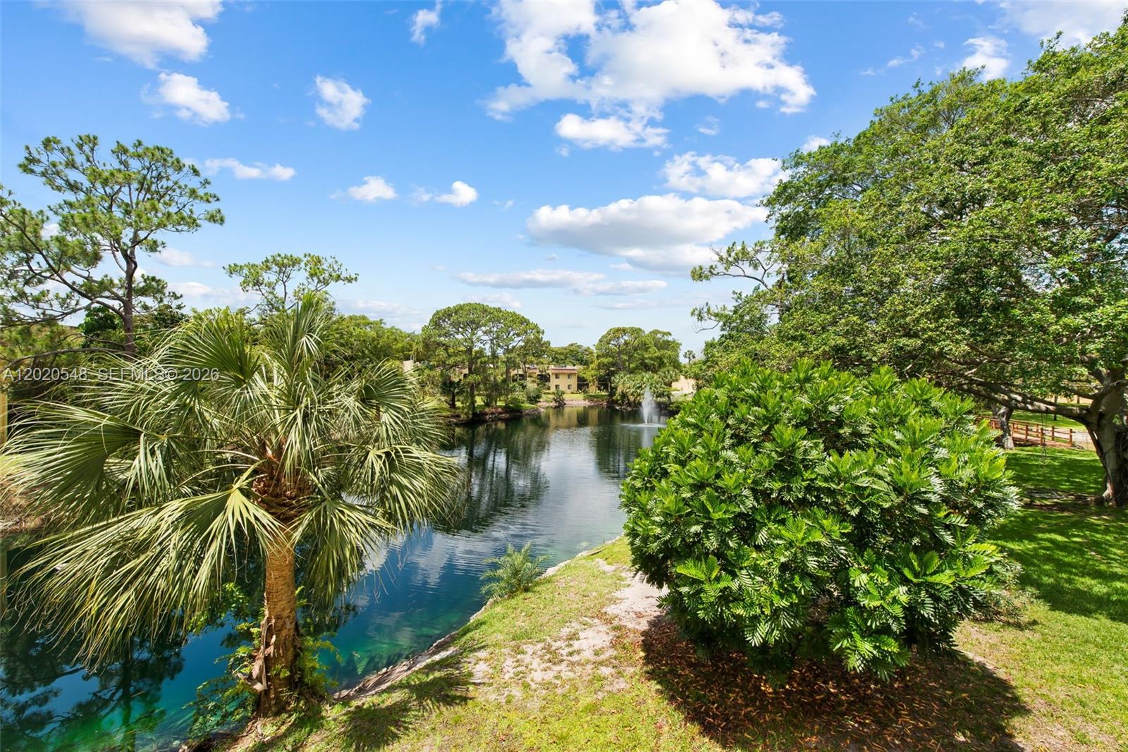 Spacious 2BR/2BA condo with stunning lake and lagoon views in the heart of Boca Raton, directly across from Sugar Sand Park. Low HOA fees. Enjoy lush greenery and peaceful surroundings from your screened terrace overlooking the water. Features include a newly updated kitchen, new washer/dryer, and new water heater. Quiet, well-maintained community with clubhouse, library, tennis courts, 2 pools, BBQ/picnic areas, assigned parking, and ample guest parking. Rare opportunity to own in one of Boca’s few budget-friendly communities zoned for highly sought-after Addison Mizner K-8 School. Just a short walk to Sugar Sand Park’s playgrounds, trails, theater, sports fields, and year-round activities. Conveniently located near shopping, dining, major highways, and Boca’s beautiful beaches. Ideal for primary residents, seasonal owners, families, or investors seeking long-term value in a prime Boca Raton location. Move-in ready — don’t miss this opportunity! Furniture is staged.