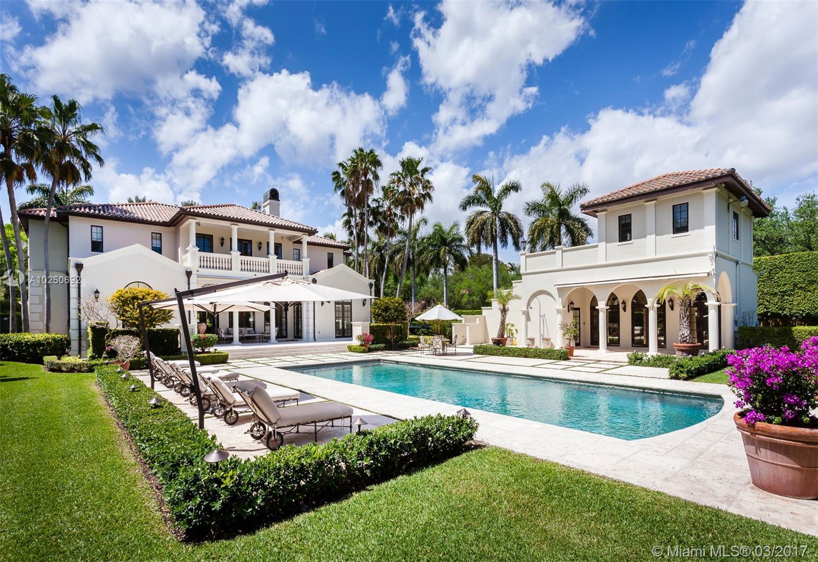 Tucked away behind a private gate, lies this enchanting estate on an impressive acre lot. Exuding elegance and serenity, the home features sprawling manicured gardens and a majestic fountain. With every room a mark of perfection, this home contains a formal dining room, living room, family room, game room, gourmet kitchen, guest house and full theater.The master suite has his-and-hers walk-in closets with custom built-ins and a private balcony overlooking the spectacular pool, gardens and basketball ct.