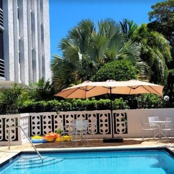 Located in a gated, well-kept 5-story, 36-unit building, this Large 2Bd/2Ba with a walk-in closet & plenty of storage space in unit, is situated in the highly-desirable neighborhood of Arch Creek East. E-stove/oven, Fridge/freezer, Dishwasher, Garbage disposal, Tankless water heater & newer AC unit. Impact windows & sliding door to screened-in patio makes for quiet interior, energy efficiency & storm protection. Security cameras both inside & out. 1st Floor 24/7 Laundry room. Great pool area w/ multiple tables, chairs & umbrellas. Nature Preserve & Biscayne Bay located at east end of the street. FIU, Mater U, (2) Publix, (3) Starbucks, Target, Costco, 24-hr Walgreens, Whole Foods & multiple restaurants all located w/i 2 miles! Fast approval for qualified tenants. READ BROKER REMARKSSpacious 2Bd/2Ba located in the highly-desired neighborhood of Arch Creek East in North Miami. Close to all conveniences!