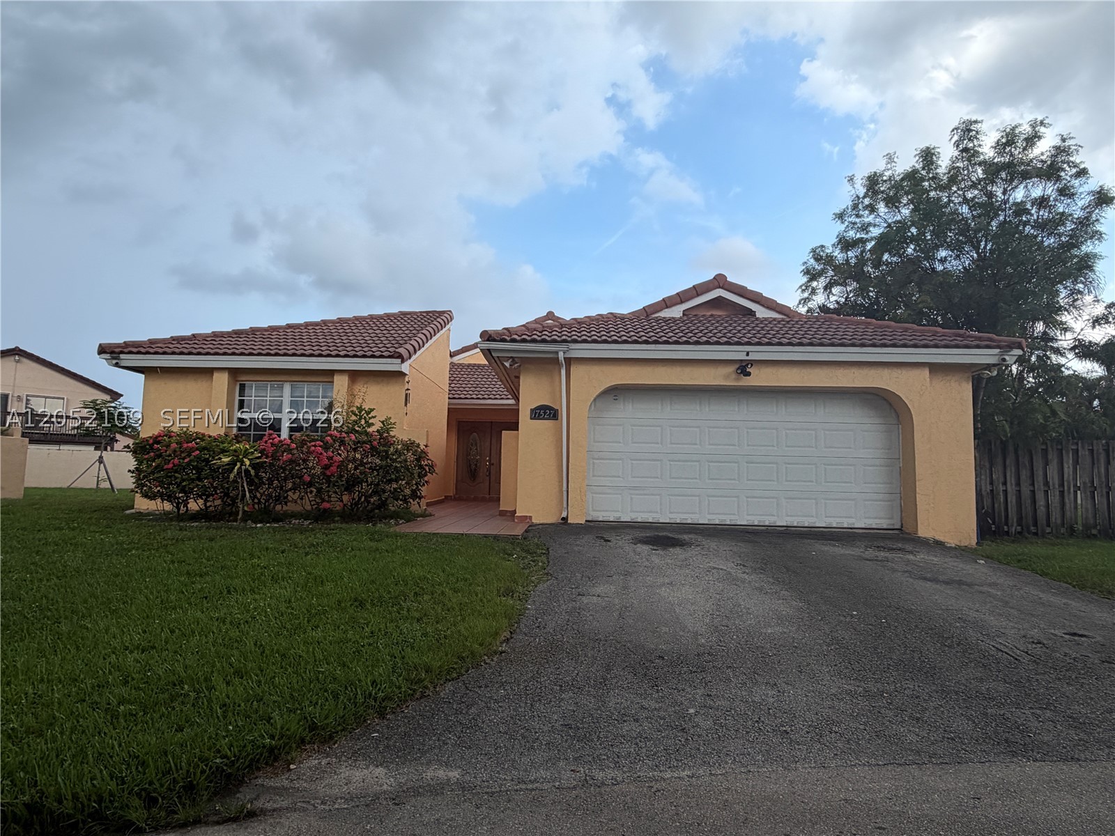 Motivated seller! Lowest-priced pool home in the Community. Features a legally converted garage, an additional room offering extra living space, high impact windows and a brand-new fence. Great value with plenty of flexible living space.