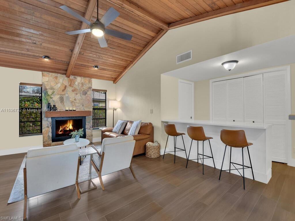 Discover your dream retreat in prestigious Whiskey Creek, SWFL! Bright, inviting interior with stunning wood vaulted ceilings. 3 beds, 2 baths for comfortable living. Enjoy privacy in the fenced-in yard and relaxation in the screened lanai with pool and spa. Serene creek views, cozy fireplace, 2-car garage, and new roof (2021) for peace of mind. Recent updates include a new pool pump (2020) and sprinkler system (2021). Community amenities include a golf course and clubhouse. Minutes from shopping, dining, and SWFL beaches.