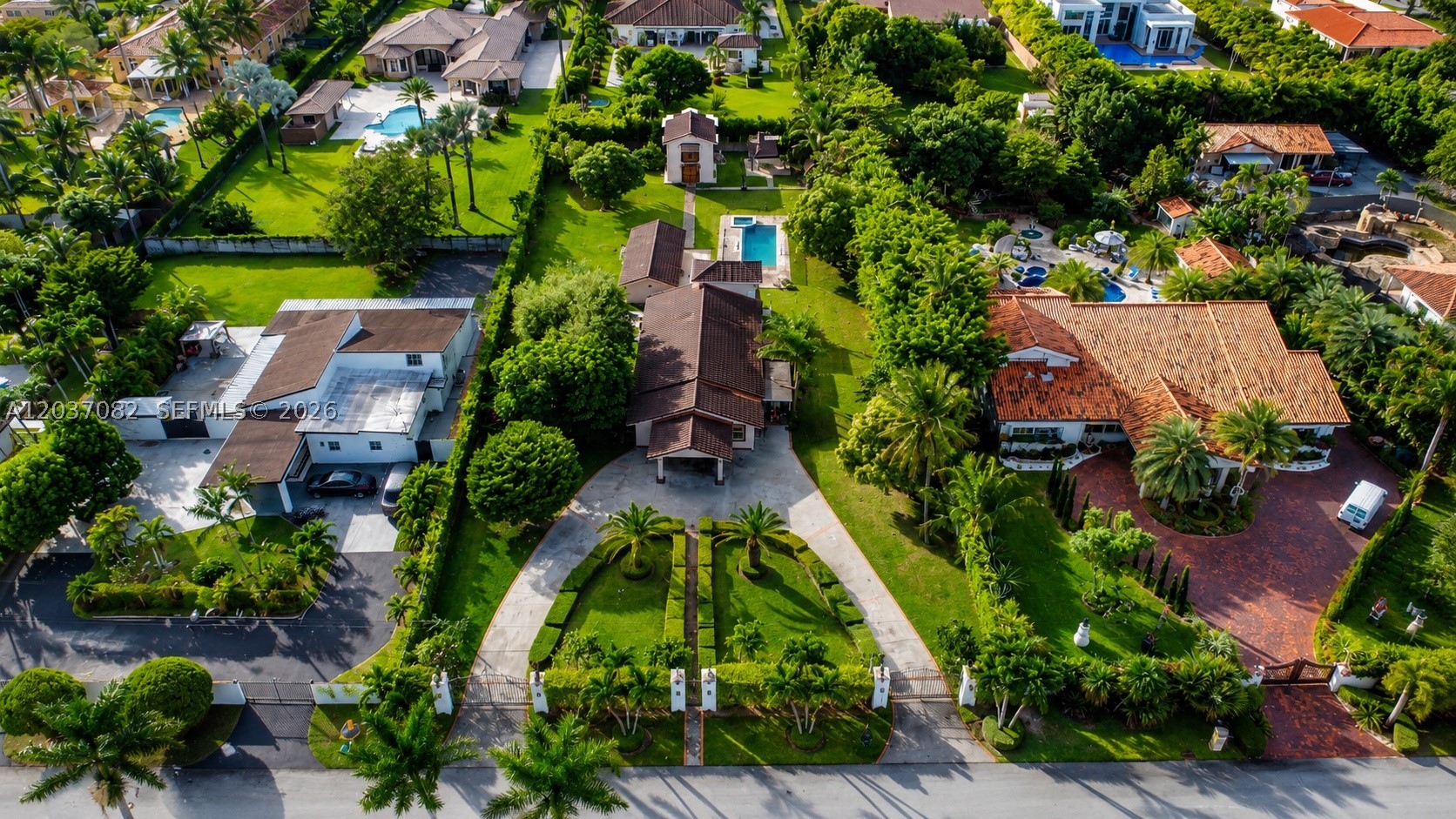 Why own one home when you can own three?

Nestled behind private gates on an oversized estate lot, this exceptional property offers a rare combination of space, flexibility, and opportunity. The estate features a main residence along with two detached guest homes, each complete with its own kitchen, living area, bedroom, and bathroom—ideal for multigenerational living, extended family, guests, or income-producing rentals.

The possibilities are endless. Live in the main residence while generating rental income from the additional homes, renovate and modernize the existing structures, or take advantage of the substantial lot to create the custom estate of your dreams.

Enjoy the ultimate South Florida lifestyle with a sparkling oversized pool, lush grounds, and expansive outdoor spaces designed for entertaining, relaxation, and everyday enjoyment. Whether you're hosting family gatherings or seeking a private retreat, this property delivers a unique sense of privacy and freedom.

Ideally located near Belen Jesuit Preparatory School, Florida International University, major highways, shopping, dining, and everyday conveniences, this property offers both tranquility and accessibility.

Properties offering three separate living quarters on a lot of this size are exceptionally rare in Miami. A unique opportunity for homeowners, investors, and developers alike.
