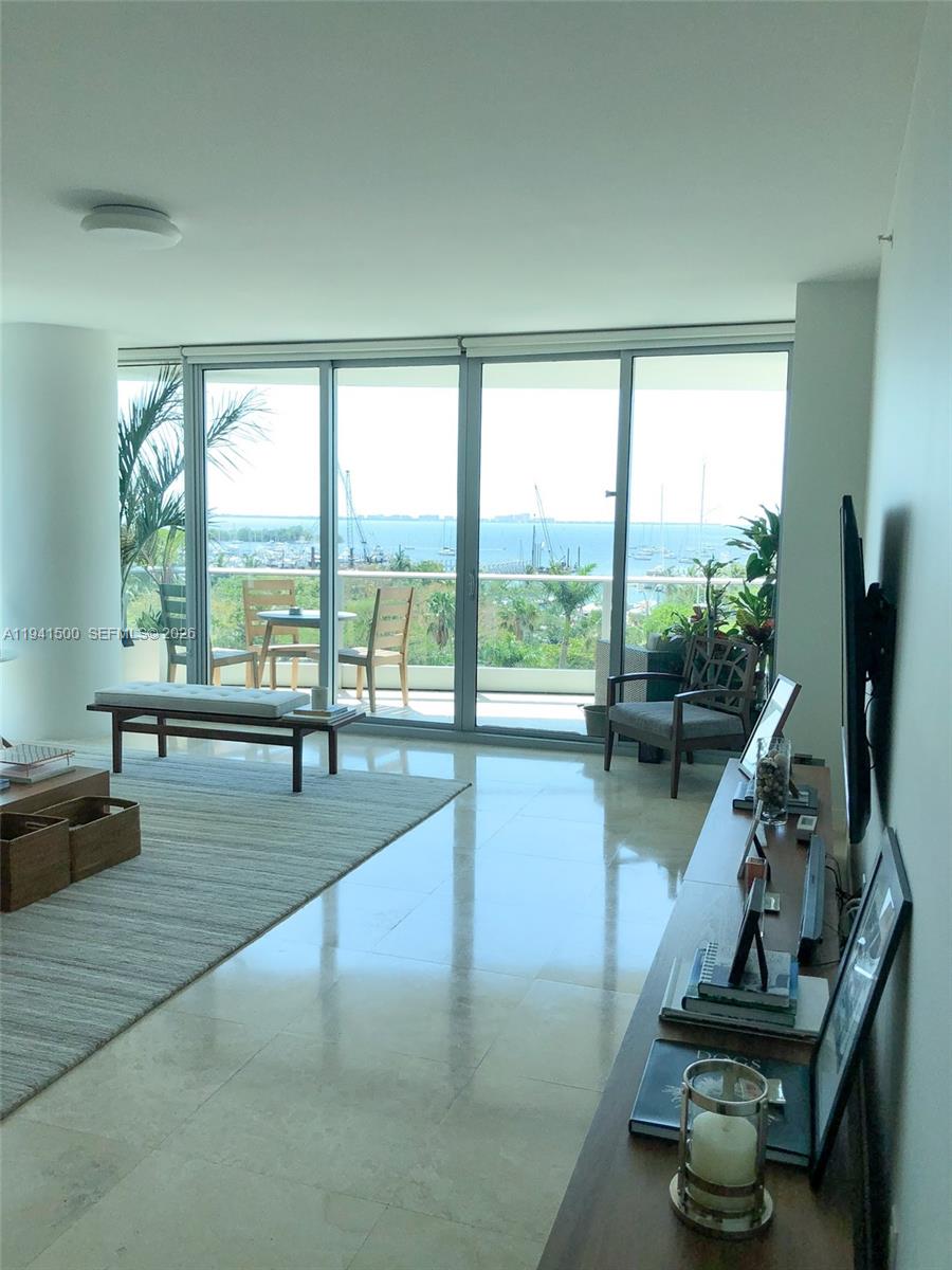 Experience the finest of Coconut Grove living in this stunning 3-bedroom, 3-bathroom home at the prestigious Grovenor House, masterfully designed by acclaimed developer Ugo Colombo. Perched on the 7th floor, Unit 701 offers 2,333 square feet of elegant living space paired with captivating ocean views.

This residence delivers a lifestyle of luxury and ease, with access to a state-of-the-art fitness center, a serene spa, and 24/7 concierge and security services. Two dedicated parking spaces and extra storage add convenience, while its prime location places you across from the marina, Fresh Market, lush parks, and an array of top-tier dining options. Families will appreciate the proximity to highly regarded schools.