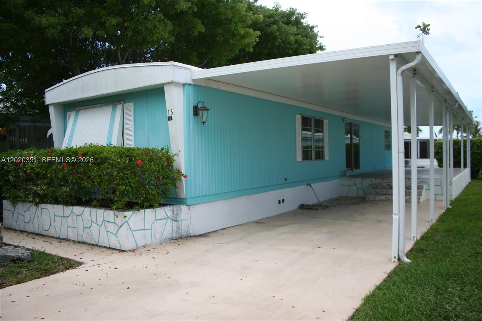 Great Community offering boating, pool, club house, laundry, ice machine and beautiful grounds at the Oceanfront community. Two bedrooms with one bathroom for your family with an open kitchen and living are combination facing the huge open patio for your outdoor entertaining. Boat dockage rental available. Three-month minimum rentals allowed. Carport for your protection for your car. Interior washer and dryer.
