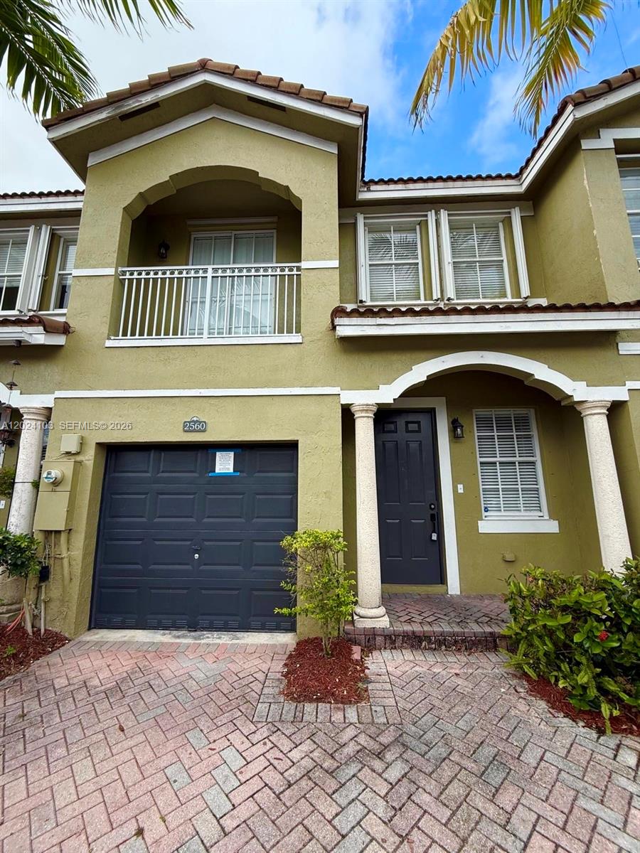 Beautifully renovated, 3BR/3BA townhouse in a highly desirable gated community! This spacious home features freshly updated wood-look flooring throughout the main level and soaring double-height volume ceilings in the living area. The fully modernized kitchen has been completely upgraded with crisp white cabinetry, sleek quartz countertops, a classic subway tile backsplash, and premium stainless steel appliances. New HVAC.

Enjoy the ultimate convenience of a full bedroom and bathroom on the first floor—ideal for guests or a home office. Through the rear sliding glass doors, step out into your private backyard space boasting serene water views.

This fee-simple property includes an attached 1-car garage and access to premium resort-style community amenities, including a sparkling swimming pool and a gym. Best of all, your monthly HOA fees already cover both cable and high-speed internet! Turnkey and ready for its new owners.