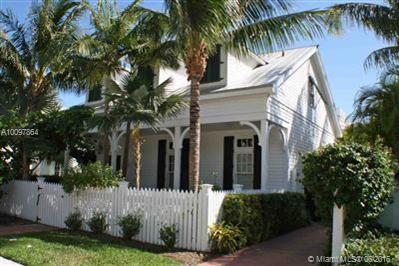 This incredible oversized waterfront home on prestigious Sunset Key Island has a separate 2/2 guest cottage. The large 2 bedroom 2 & 1/2 bath main house is connected to the guest cottage via a landscaped trellis covered walkway, and in between the houses is a lushly landscaped private pool/courtyard. View the famous Key West Sunsets from your back yard, or from the rooftop deck. . Ample parking on the Key West side. Just a 3 minute boat ride from historic downtown Key West via the 24 hour island ferry.