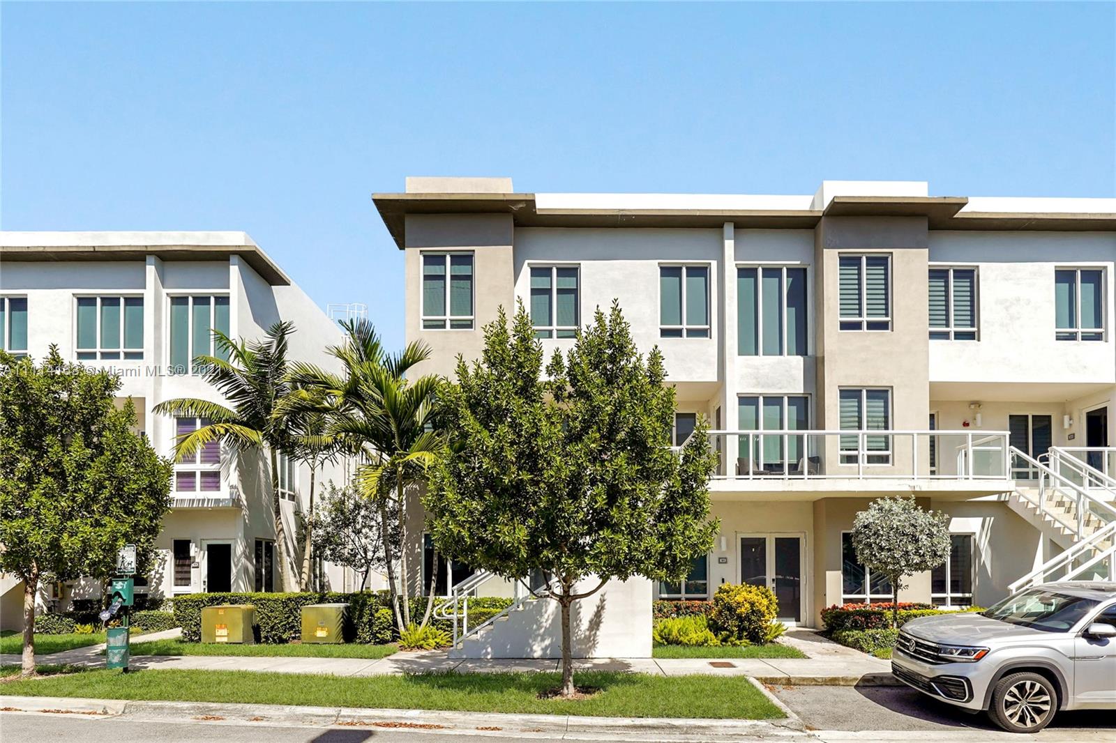 Feast your eyes and fall in love with this gorgeous 3 bedroom, 3 bathroom townhouse in Doral! This lovely home offers many awe-inspiring features that will make you feel right at home. Walk inside and you are welcomed with a charming foyer entryway, spacious living room, charming dining area and a phenomenal kitchen with stainless steel appliances and cooking island with snack bar. One full bedroom and bathroom on the first floor. Upstairs you have two commodious master suites. Each with a large walk in closet and their own private bathroom! Community offers a plethora of amenities including a resort style pool, lounging areas, BBQ, sauna, spa, kiddie pool, gym, business center and so much more! In Doral where you have everything you can imagine just minutes away!