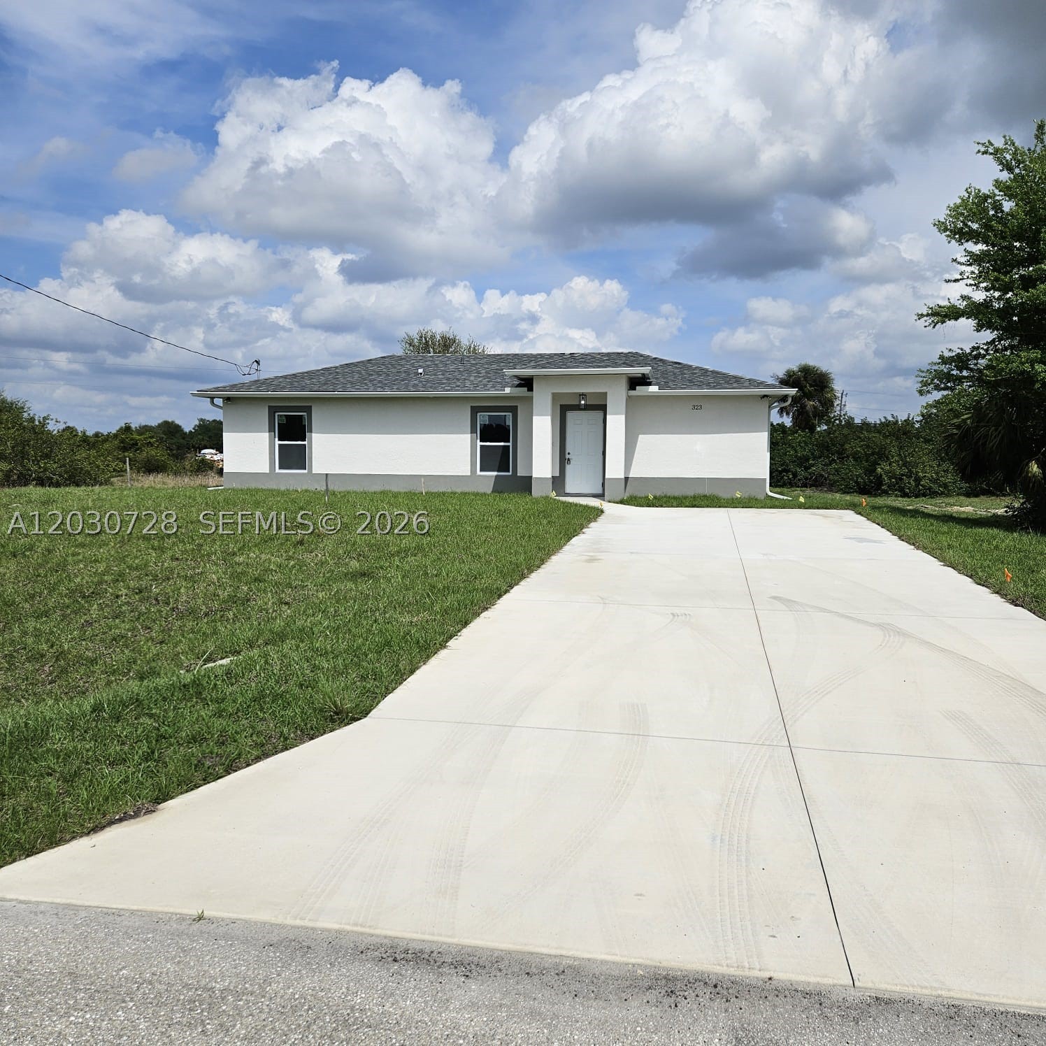 CORNER LOT + $10,000 TOWARD BUYER'S CLOSING COSTS! Welcome to this stunning, move in ready 3 bedroom, 2 bath home located in one of the fastest-growing areas of Lehigh Acres. Thoughtfully designed with a modern open concept layout, this beautiful residence offers the perfect combination of style, comfort, and functionality for today's lifestyle. From the moment you enter, you'll appreciate the bright and airy living spaces, abundant natural light, and seamless flow between the living, dining, and kitchen areas; perfect for everyday living and entertaining. The spacious design creates a warm and inviting atmosphere, making it easy to feel at home from day one. Situated on a desirable corner lot, the property offers additional outdoor space and privacy, with a backyard ready for pets, family gatherings, outdoor entertaining, or creating your own private Florida retreat. Whether you envision a garden, a play area, or a relaxing outdoor oasis, the possibilities are endless. Ideally located with convenient access to SR-82, Daniels Parkway, Six Mile Cypress Parkway, and I-75, this home places you just minutes from The Crossroads Shopping Center, The Forum, restaurants, grocery stores, schools, parks, daycare facilities, Southwest Florida International Airport, and major employment centers. Enjoy the perfect balance of peaceful residential living and easy access to everything Southwest Florida has to offer. To make homeownership even more attainable, the seller is offering $10,000 toward the buyer's closing costs with an acceptable offer. Don't miss this exceptional opportunity to own a beautiful home in a thriving community with strong future growth potential. Schedule your private showing today!