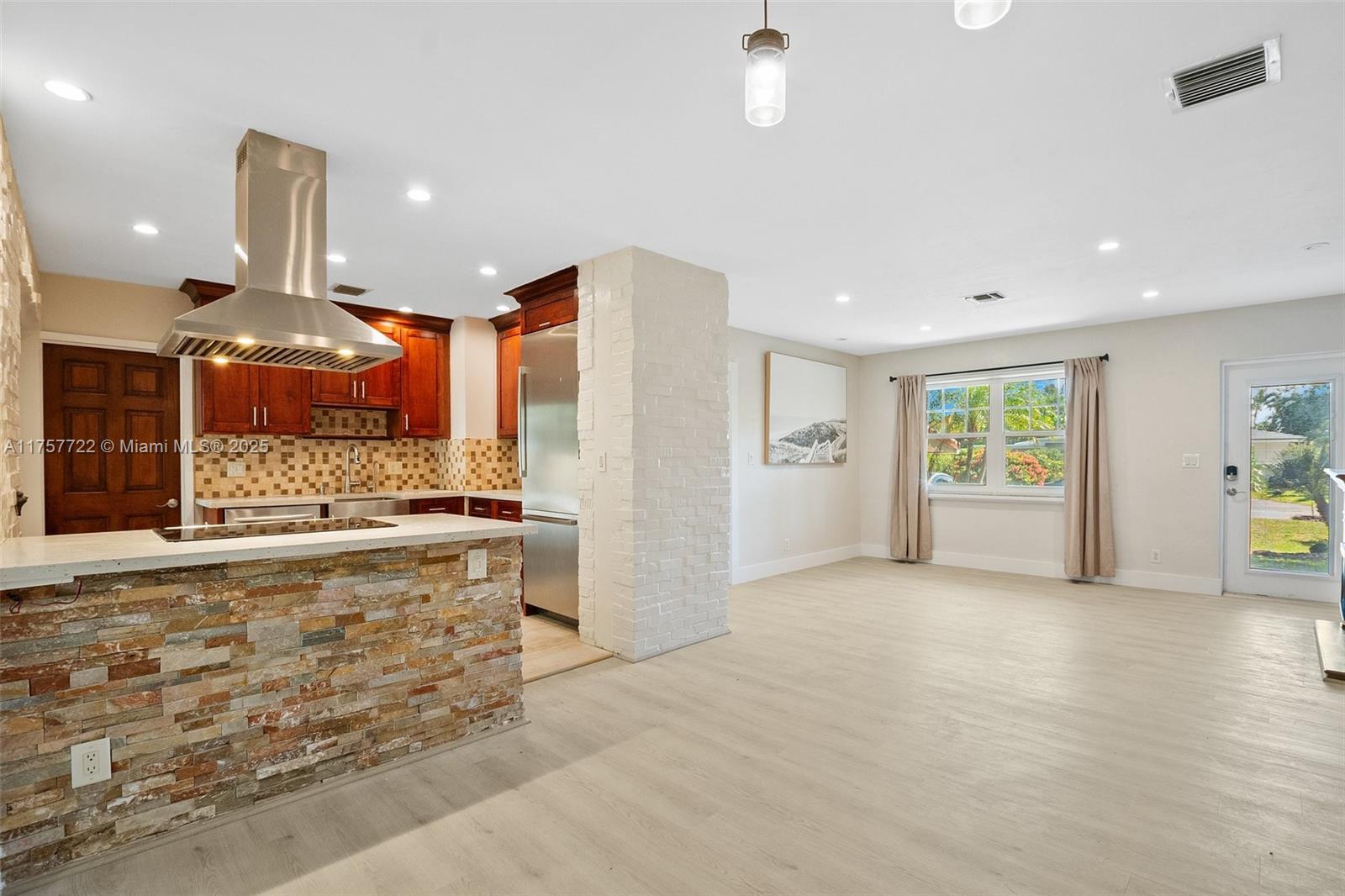 Beautifully renovated and move-in ready, this stunning three-bedroom, two-bathroom home in Coral Shores offers modern elegance with thoughtful upgrades.

Featuring new flooring throughout and a certified roof, it combines style and peace of mind.

The open-concept design highlights a sleek kitchen with stainless steel appliances, including a high-end Sub-Zero refrigerator.

The modern pool layout seamlessly connects to a cozy backyard, creating the perfect retreat for relaxation and entertaining.

Conveniently located just 15 minutes from the beach, with easy access to shopping, dining, and the best of Fort Lauderdale, this home is a true gem.
Easy to show. Contact listing agent.