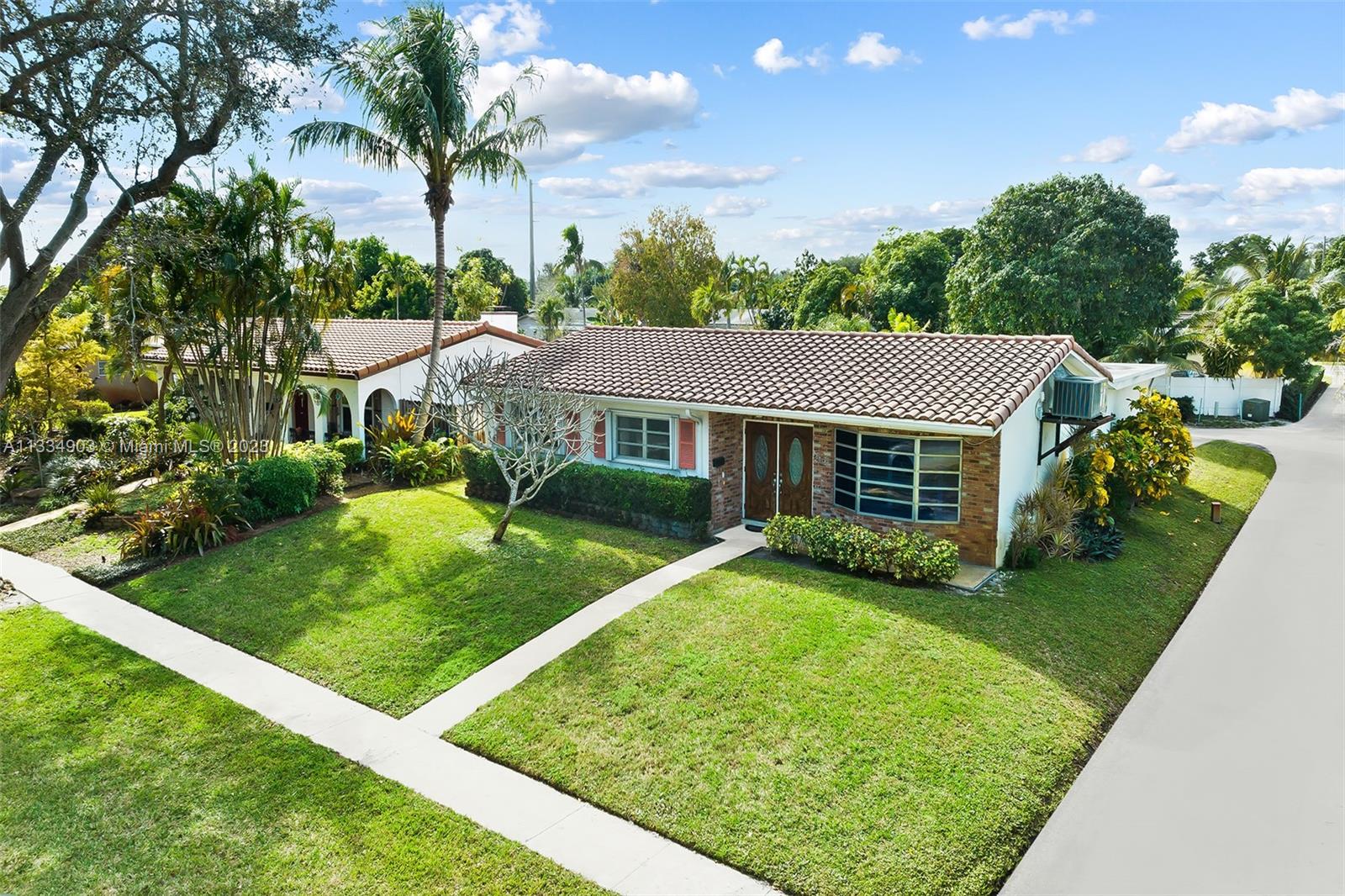 Located in one of the most desirable locations in Hollywood Hills, this corner lot pool home is waiting for your personal touches. Good flow for entertaining with eat-in kitchen plus formal dining room. Large family room has space for a variety of functions: media room, office, playroom. Primary bedroom has ensuite bath and plenty of storage. 2 guest bedrooms share a bathroom that features pristine original mid-century tile and tub. The fenced backyard is a private oasis with large well-maintained pool and patio area. The single car garage is accessed via the alley and has internal home entrance for additional privacy. Convenient location near shops and top schools, just minutes to Hard Rock, I-95 and beaches.