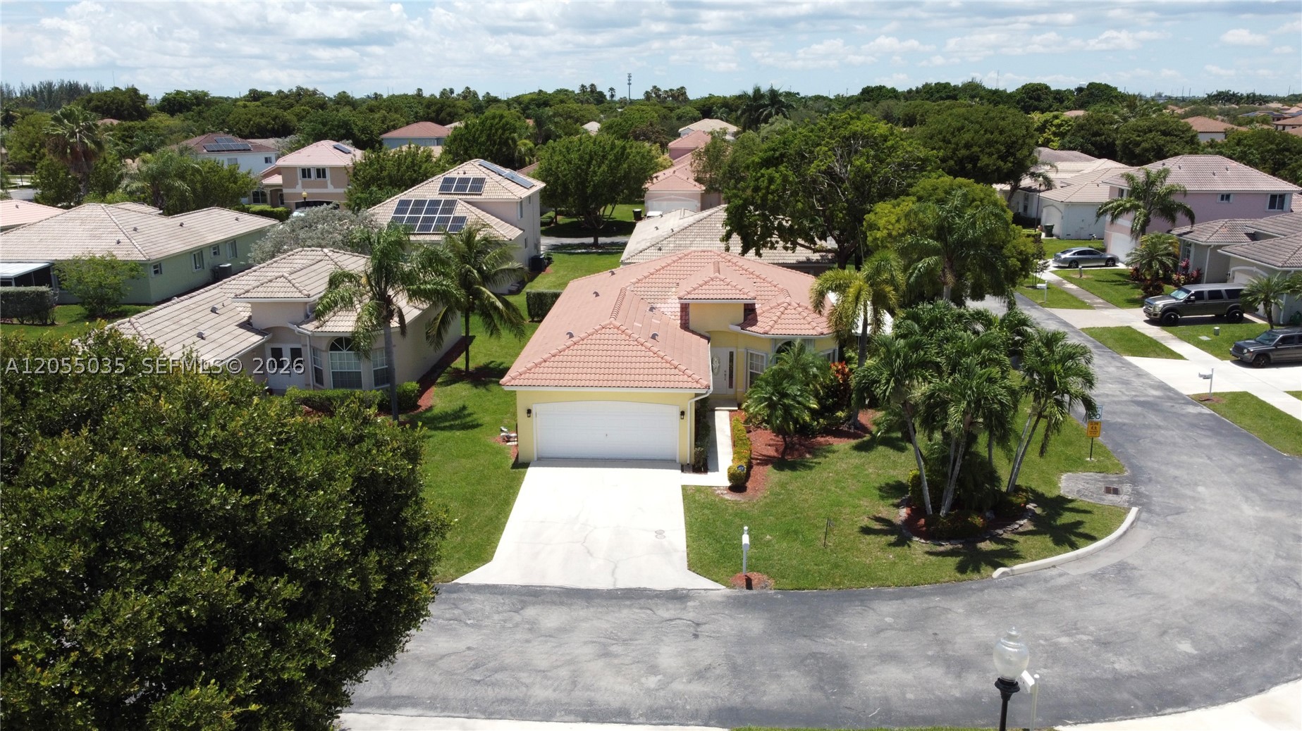 Spacious 3BR/2BA corner home in desirable Keys Gate! This property can be sold fully furnished. This larger unit features a welcoming foyer, bay window in the living room, separate dining area, and a bright family room w/ sliding door. Kitchen offers white cabinets, pantry & glass door leading to a large, screened patio with a ceiling fan. Great for relaxing or entertaining. Bedrooms have wall-to-wall closets; the primary suite includes a walk-in closet & tray ceiling. Primary bath has double sinks, extended counter, shower, private toilet room & linen closet. Guest bath w/ tub/shower. Laundry room with washer, dryer, hot water heater, and shelves. 2-car garage w/ automatic doors. Laminate floors, ceiling fans & accordion shutters throughout.