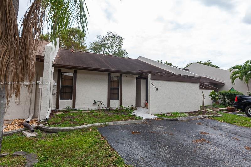 Beautiful  2 Bed, 2 Bath East Lake Villa Townhome In Desirable Pembroke Pines Is Located On A Premium Lot with Stunning Long Lake Views. Gorgeous Remodeled Kitchen Features Custom Wood Cabinetry & Stainless Steel Appliances. Brand New Floors Throughout Entire Home & Patio. Enjoy Elegant Vaulted Ceilings & Pristine Water Views Throughout This Lovely Villa. A Spacious Primary Suite Offers An Ensuite Shower & Walk-In Closet With Custom Built-Ins. An Enormous Screened & Covered Patio Is Perfect For Outdoor Living/Dining/Entertaining W Access To The Waterfront. Accordion Shutters & Assigned Parking. All In A Convenient Location W Close Access To Shops & Restaurants. Per Hoa: Min Credit Score For Buyers Is 650.  1 Year Hoa Fee To Be Paid & Held In Escrow. No Lease First 3 Years Of Ownership.