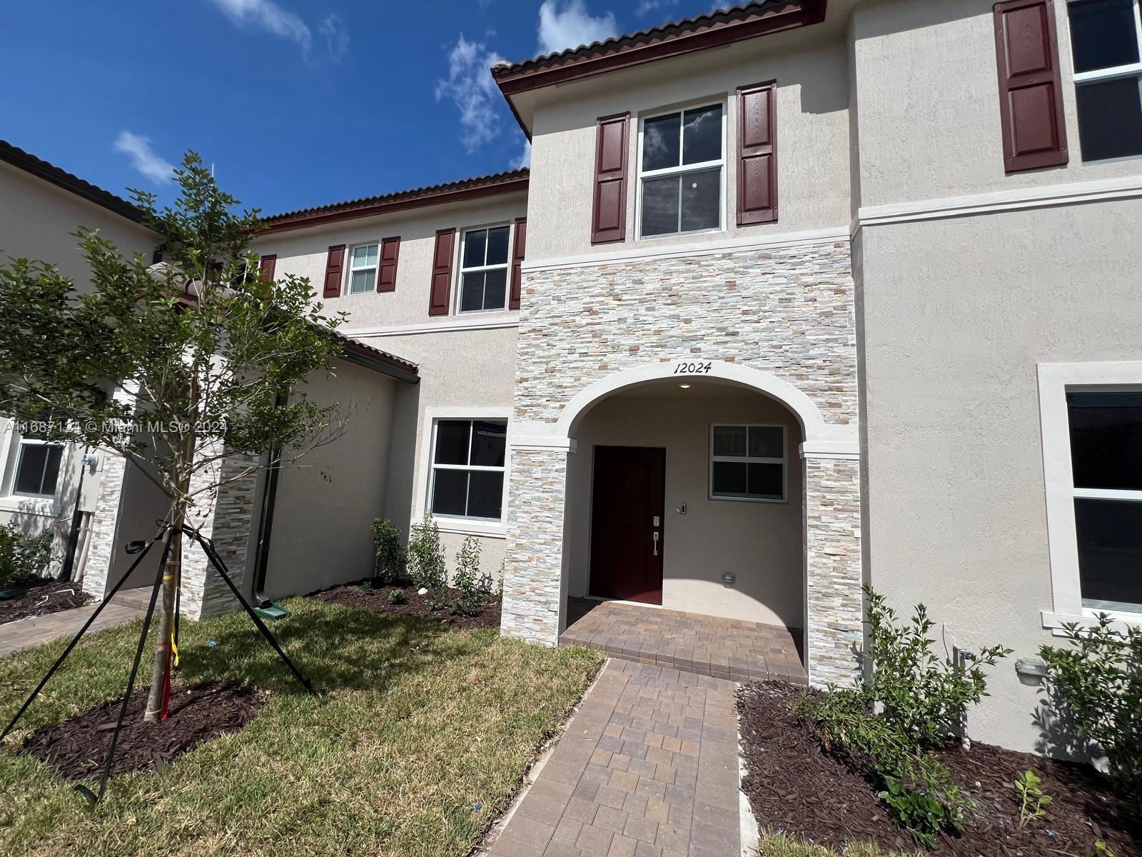 Brand new charming townhouse featuring elegant hardwood stairs and a spacious common area perfect for relaxing or entertaining 3 beds and 2.5 baths. Located in a well-kept Miami community with easy access to local amenities club house, gym and dog park.