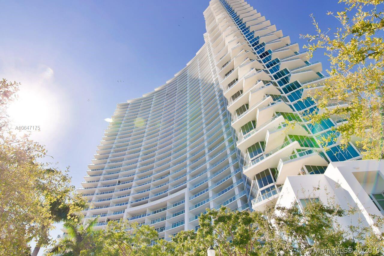 Spectacular one-of-a-kind 4Bd/4.5Bths penthouse with fantastic sweeping unobstructed 360 degree views of Miami Beach, Downtown Miami, and Uptown. The closest thing to Heaven in Miami. Gorgeous finishes + upgrades throughout, interiors by Whitney Bloom, sold fully designer furnished. Stunning  white 36x36 marble floors throughout w/12 ft. ceilings, 4,055 interior Sq. Ft. with 4 balconies. Master bedroom wing with private balcony, spa bath with dual sinks, stand alone tub, separate shower + midnight kitchen & giant his/her closets. Custom open kitchen + Subzero wine bar, separate office/in laws quarters with its own entrance.