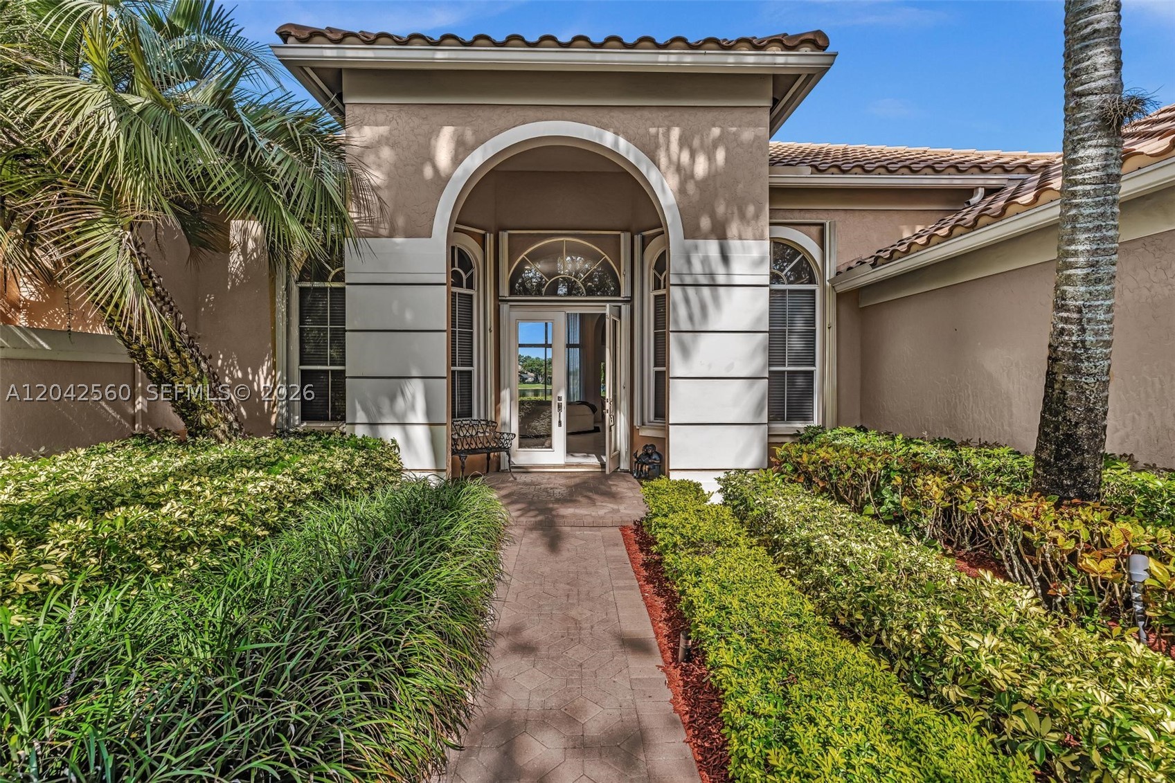Welcome to Weston Hills—Weston’s most coveted community—where this stunning home boasts the best water view on the block! From the moment you step inside, you’re greeted by an open floor plan filled with incredible natural light, creating a bright, airy, and uplifting atmosphere. Extensive upgrades shine throughout, along with beautiful built-in cabinetry that adds both style and function. Every space feels thoughtfully designed and effortlessly inviting, making this home truly unforgettable. Opportunities like this don’t come often—this is an absolute must see!