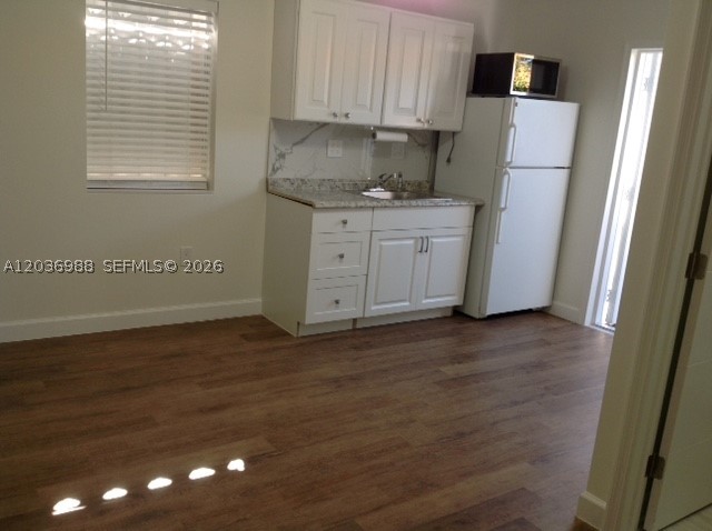 STUDIO for 1-person, small kitchenette with microwave and refrigerator.  Private entrance.  Rent includes electricity, water, Wifi, and is centrally located minutes to Gables, Miami Airport, DT/Brickell.  Near supermarkets and public transportation.  As per the Landlord, non-smoker and NO PETS.  Move in funds, 1st month, last month, and security deposit.