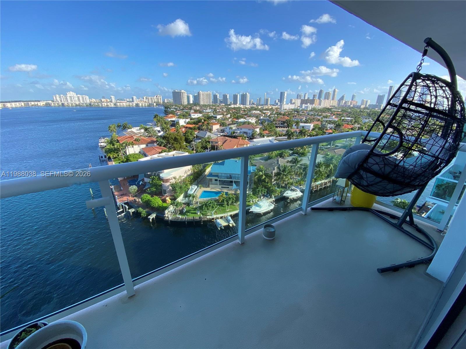 Gorgeous 1 bedroom 1bath home awaits you with spectacular water view from the moment you walk in. Enjoy amazing sunrises and sunsets, boat, dolphin, manatee sightings from your balcony. This home features impact windows - lower electric bill, and peace of mind during hurricane season-, 2 huge walk in closets, onyx counter top, new fridge. Great location, across from Oleta park, 1 mile from the beach and Sunny Isles, 5 minutes to aventura mall, short walk to many great new restaurants, few minutes drive to Bal Harbour Shops, Costco, FIU. The best location with the most beautiful view you will find at this price. Building offers heated pool, bbq, game room, water access for your kayak or sup. 1 parking space/1 car only!