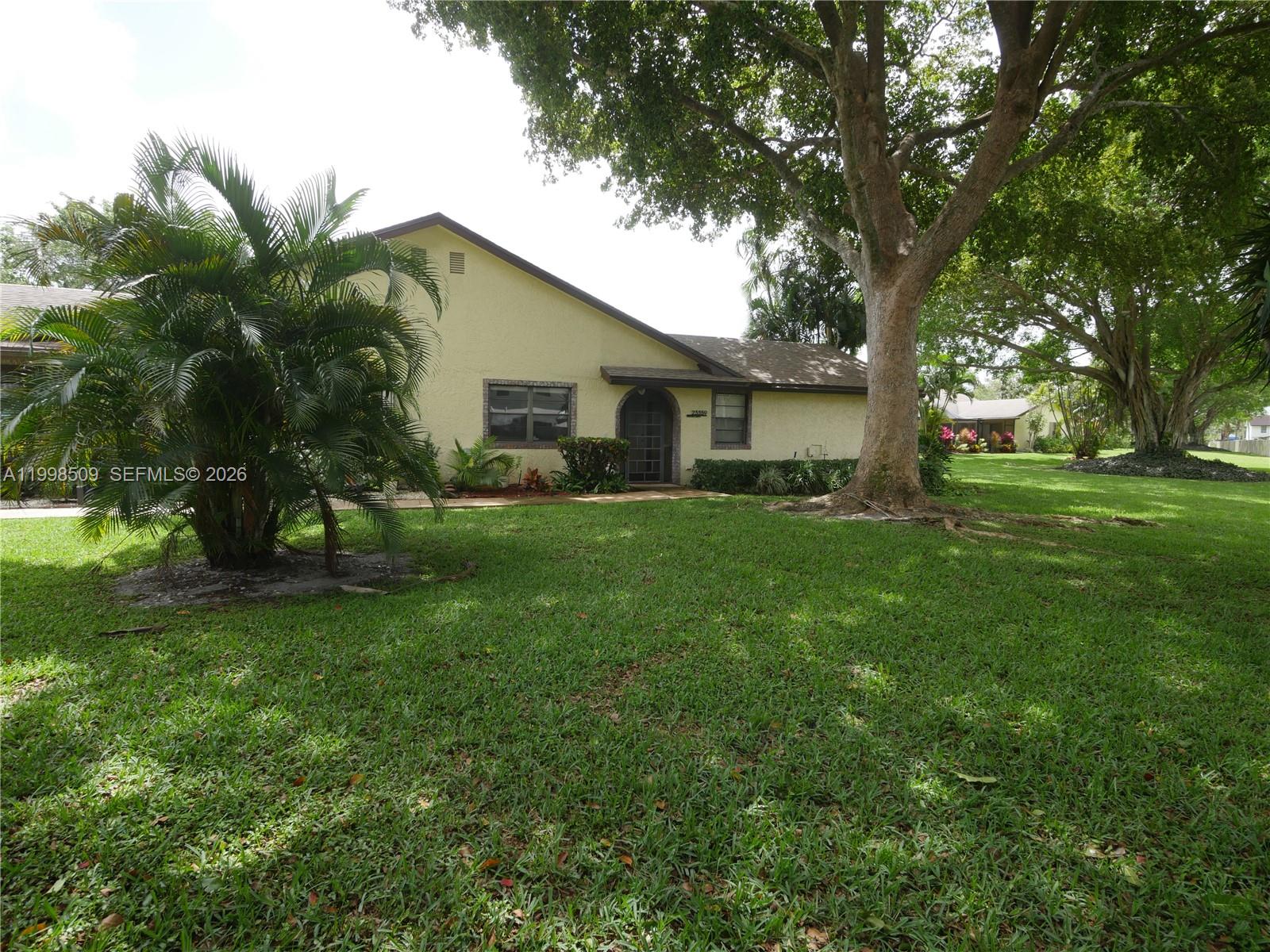 This warm and cozy 2-bedroom, 2-bath villa is nestled in the charming 55+ community of The Lakes of Boca Barwood in beautiful Boca Raton. It offers 1,586 sq ft of living space, featuring two spacious bedrooms with large walk-in closets, a roomy living and dining area, a well-appointed kitchen, and a large walk-in laundry room/pantry. Adding to its appeal is a 560 sq ft screened-in patio overlooking a lovely garden. With lush green views, wonderful neighbors, and the friendliest dog-loving community around, it’s the perfect recipe for a beautiful home. New Roof in 2024 and A/C in 2021 so no worries there! For those seeking a peaceful community with plenty of available recreation, this is it!