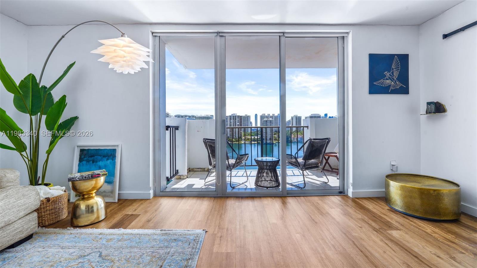 Breathtaking water views from the moment you walk in. This fully renovated 2-bed, 2-bath condo features a custom kitchen, tile floors, and remodeled bathrooms with modern finishes. Designed in warm, contemporary tones with impact windows and doors throughout. The spacious layout flows easily from living to dining to a balcony made for sunrise mornings. This unit also includes a large private storage unit — perfect for keeping things organized. Enjoy resort-style amenities like tennis courts, a brand-new pool and deck, fitness center, marina, and more. All just minutes from Aventura Mall, Publix, dining, and the Circle walking path. Aventura living at its best.