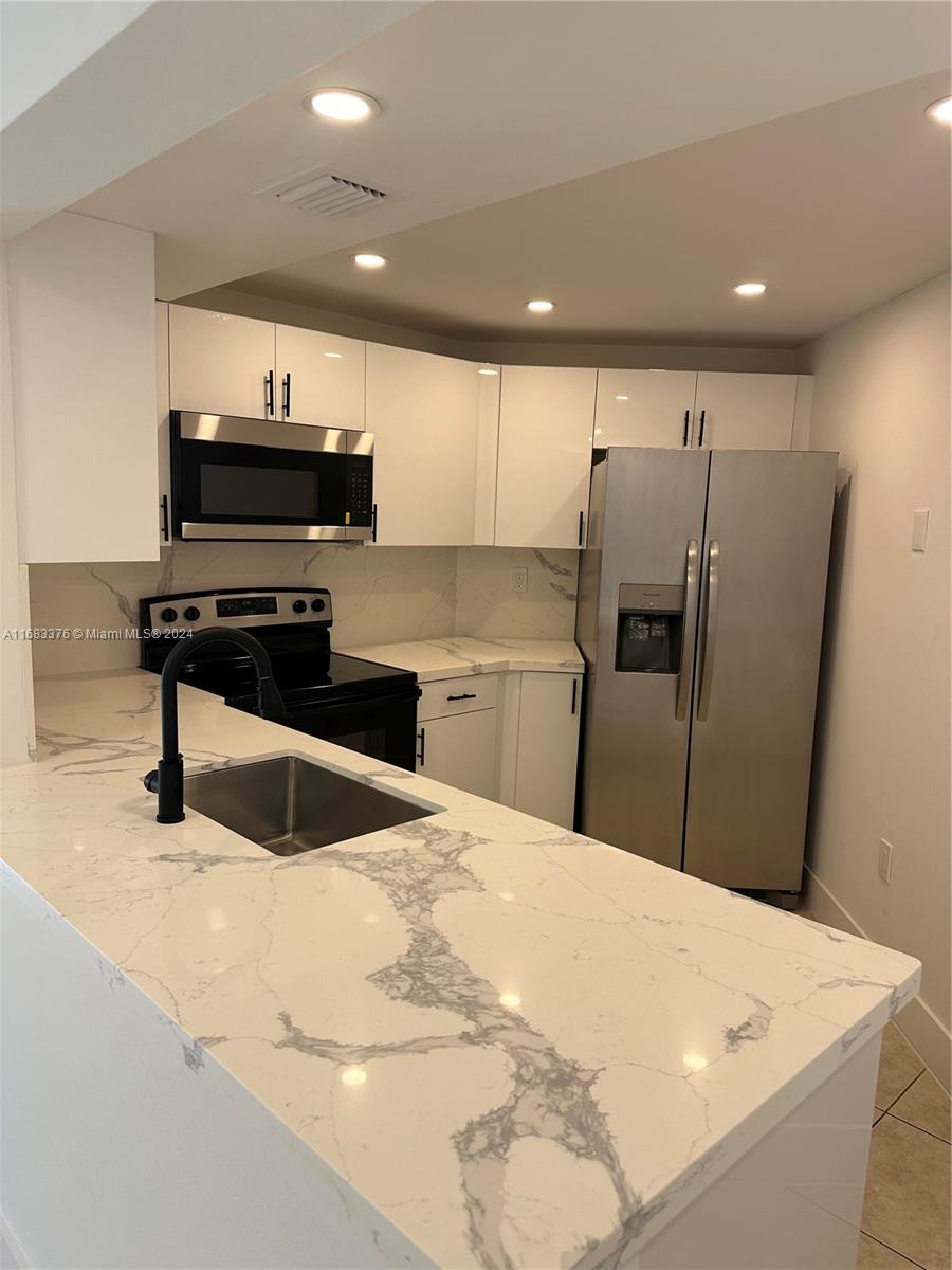 Fantastic Remodeled 1st floor Condo in the super desirable area of Fontainebleau 2 Bedrooms, 2 Bath, laundry inside the unit & private patio, new kitchen and baths, new stainless-steel appliances, lots of close and storage space. Super clean and bright. This beautiful gated community offers: 24 hrs. Security, 3 pools, tennis courts and many green areas, minutes away from excellent schools, malls, shops and expressway. Your unit include 2 Parking Spaces. Small Pet Friendly. Summit with you offer: rental application, IDs, Banks statements & paystubs of the last 3 months, Police Report. Credit report will be run by listing agent with RentSpree. Tenant shall pay a security deposit of $ 500 to the Association refundable at the end of the lease. Please text listing agent for appointments & info.