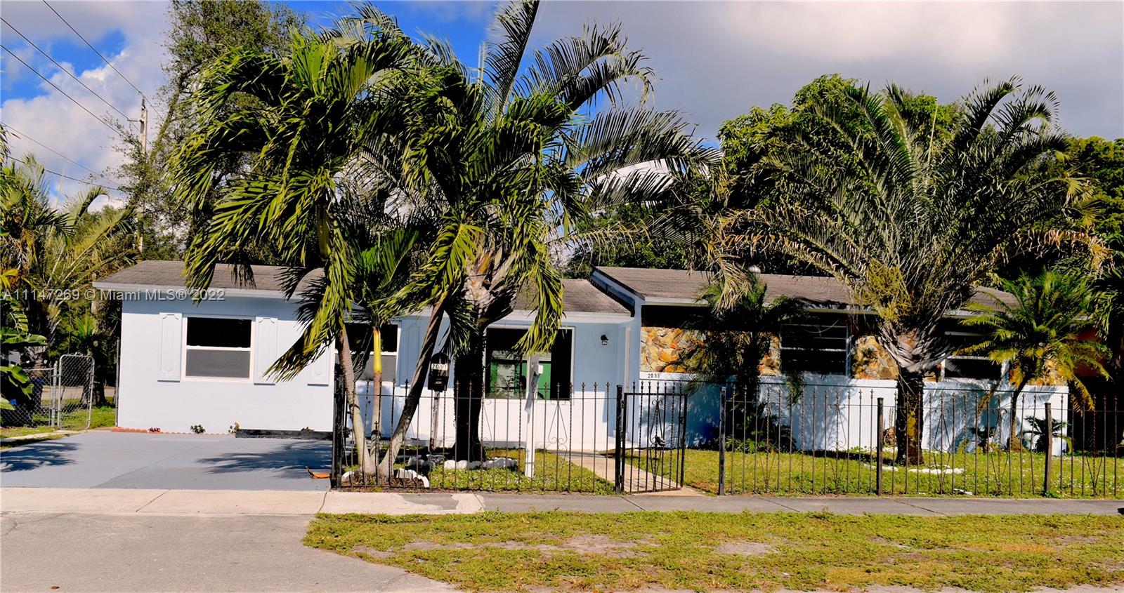 "Beautifully renovated 1636 sq ft livable home with 4 bedrooms and 2 bathrooms. New modern kitchen with beautiful quartz counter tops and soft close cabinets. Two newly renovated modern bathrooms with beautiful Calacatta Venato polished porcelain tile. This huge corner lot home has a large parking space perfect to accommodate a boat and truck. This home has a private entrance with the potential to create a lucrative rental environment. Home includes impact exterior door and Single Hung Vinyl Impact windows." READY TO MOVE IN!