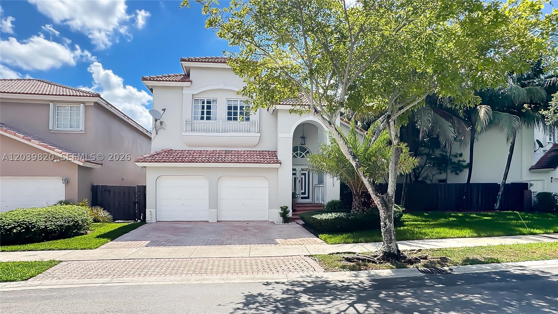 Enjoy living in this beautifully remodeled home located in the highly sought-after Doral Isles community. This gated and patrolled neighborhood is renowned for its resort-style amenities, including a state-of-the-art fitness center with daily classes, three expansive swimming pools, event spaces, basketball, soccer, tennis courts, on-site restaurant, playgrounds, and a variety of community activities. This stunning residence features fully renovated bathrooms, a modern kitchen with new cabinetry and brand-new stainless steel appliances, elegant stainless steel stair railings, and a beautifully landscaped backyard perfect for entertaining and relaxing. Additional upgrades include a new refrigerator, dishwasher, range, microwave, garbage disposal, new downstairs A/C unit, and a new water heater. Conveniently located near top-rated A+ schools, shopping, dining, and major highways. A true move-in-ready gem!