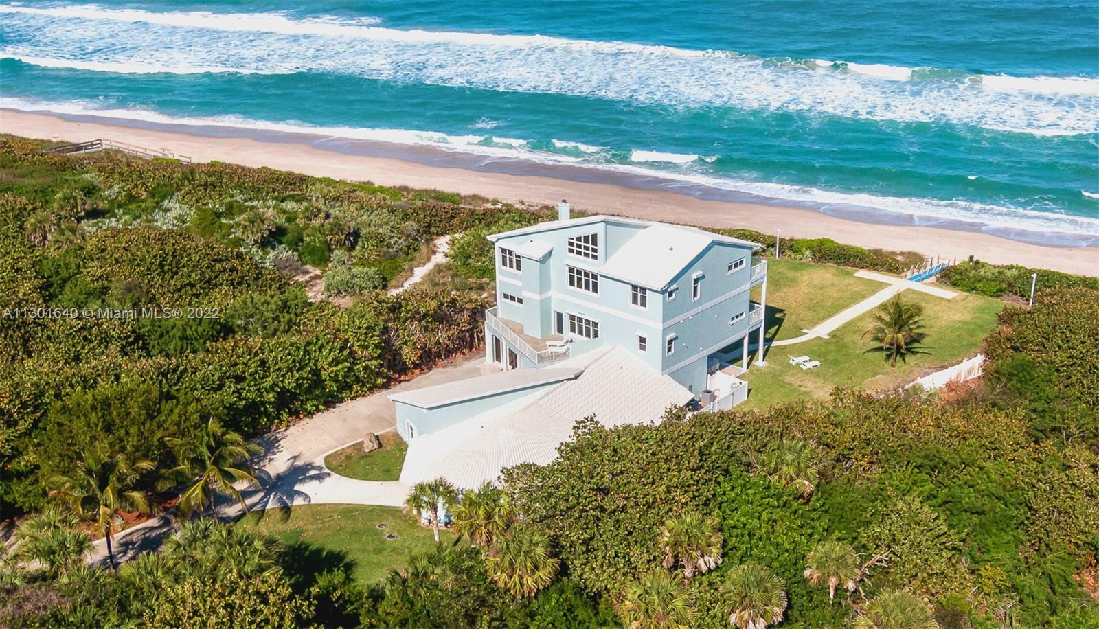 Investors attention! This property has just been appraised! Stunning 3 story Beach House located on the Atlantic Ocean on 1.19 acres. Spectacular views of the ocean and private beach access. Enjoy stunning views on the spacious balconies and watch the sunrise overlooking the ocean. Very quiet beach! Extra Large 3 car Air-Conditioned Garage includes an additional converted bedroom/hobby room. Marble floors throughout the house. Additional gaming room with Ping-Pong table and Arcade Games. The House will be sold fully furnished. 4 brand new AC's, new water pump separate full cabana bathroom outdoors , walk in teak wine room, private elevator 2 brand new pergolas and fire pit have just been added to the backyard. House rents very well!