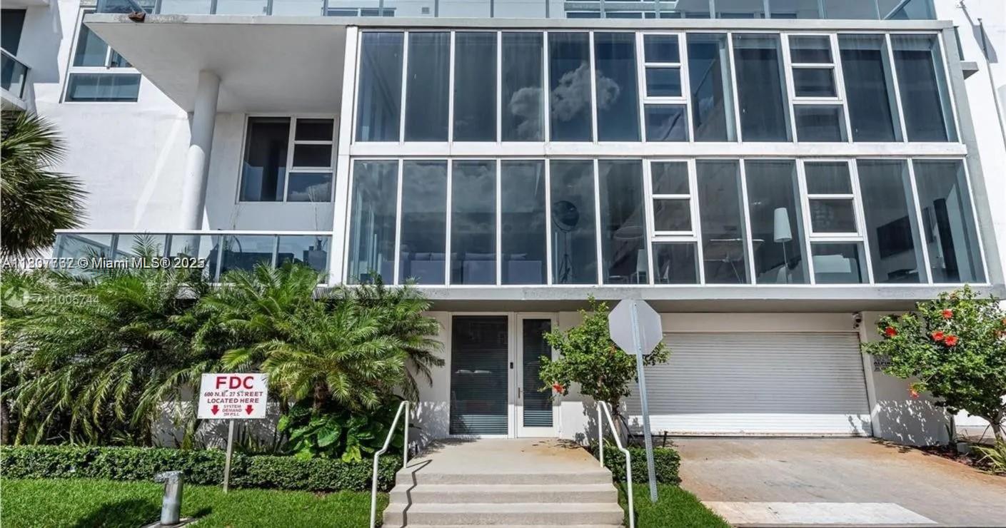 An exclusive opportunity to own a unique one-of, Developeres unit. A completely custom, 3 story Townhouse, located in the upper east side of the ever so popular Edgewater neighborhood. Walking distance to both Design District and Midtown. The house sits on the south side of the newly trending Bay House Luxury Residence Tower. With full access to the building. Well complimented by a breath-taking bay view rooftop pool with full size cabanas and barbecues. The only unit with a private 2 car garage and its own private entrance. Unlike any other of its kind, it was additionally architecturally designed with a full terrace on the 2nd floor rather than just a terrace on the roof.