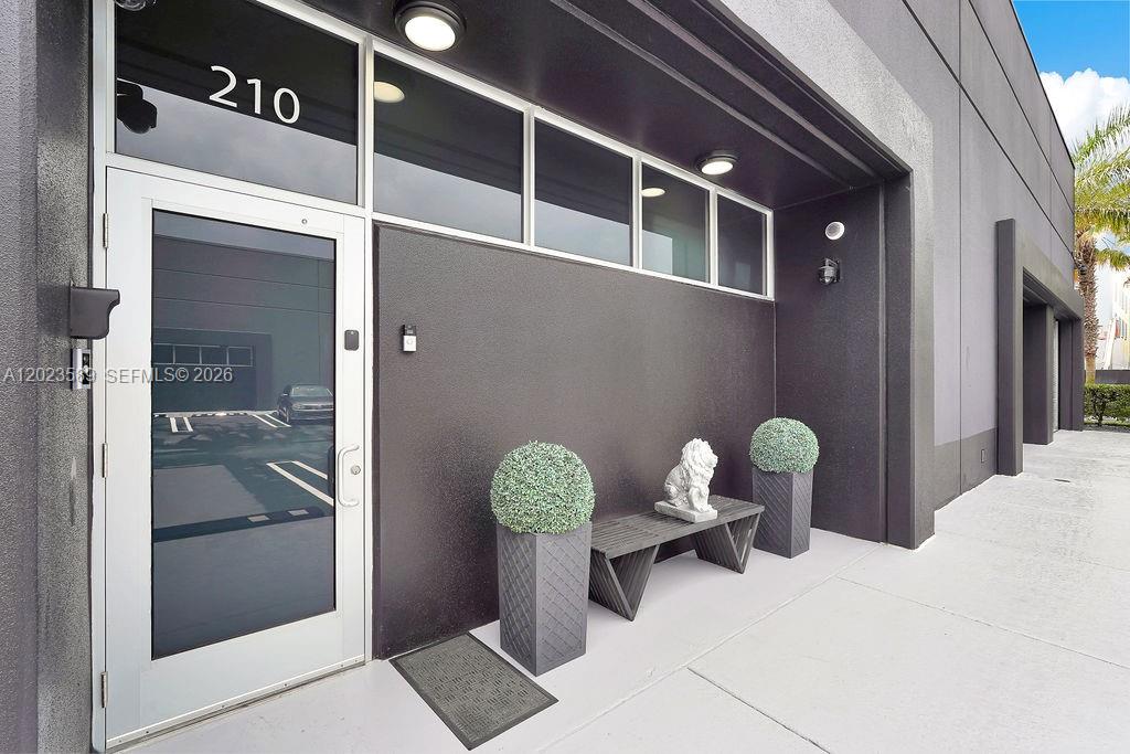 PRIME DORAL AUTOMOTIVE FLEX SPACE NOW AVAILABLE AT THE COLLECTION SUITES DORAL (UNIT 210), WITH THE OPPORTUNITY TO PURCHASE UNITS 210 & 211 TOGETHER OR SEPARATELY. OFFERED AT $3.7 MILLION FOR BOTH UNITS COMBINED, OR 1.85M SEPARATELY THESE HIGH-END, TWO-STORY AUTOMOTIVE WAREHOUSE CONDOS TOTAL NEARLY 4,000 SQFT (1,966SQFT EACH) OF PREMIUM SPACE IN ONE OF DORAL’S MOST DESIRABLE LOCATIONS. DESIGNED FOR THE CAR ENTHUSIAST, ENTREPRENEUR, OR INVESTOR, THIS LUXURY FLEX SPACE FEATURES PORCELAIN TILE FLOORS, CAR LIFTS/HOLDERS, DOUBLE-SIDED ACCESS, A FULL KITCHEN, FULL BATHROOM FOR EACH UNIT, AND DEDICATED AREA FOR LOCKERS OR SAFE STORAGE. IDEAL FOR LUXURY CAR STORAGE, A PRIVATE MAN CAVE, AUTOMOTIVE SHOWROOM, CONTENT CREATION STUDIO, CIGAR LOUNGE, EXECUTIVE OFFICE, PRIVATE GYM, OR EXCLUSIVE MEETING SPACE. THIS UNIQUE PROPERTY BLENDS FUNCTIONALITY, LUXURY, AND LIFESTYLE IN THE HEART OF DORAL, SURROUNDED BY MAJOR HIGHWAYS, TOP RESTAURANTS, AND HIGH-END COMMERCIAL DEVELOPMENT. A RARE OPPORTUNITY TO OWN A VERSATILE TROPHY FLEX SPACE IN MIAMI’S FASTEST GROWING COMMERCIAL MARKET.