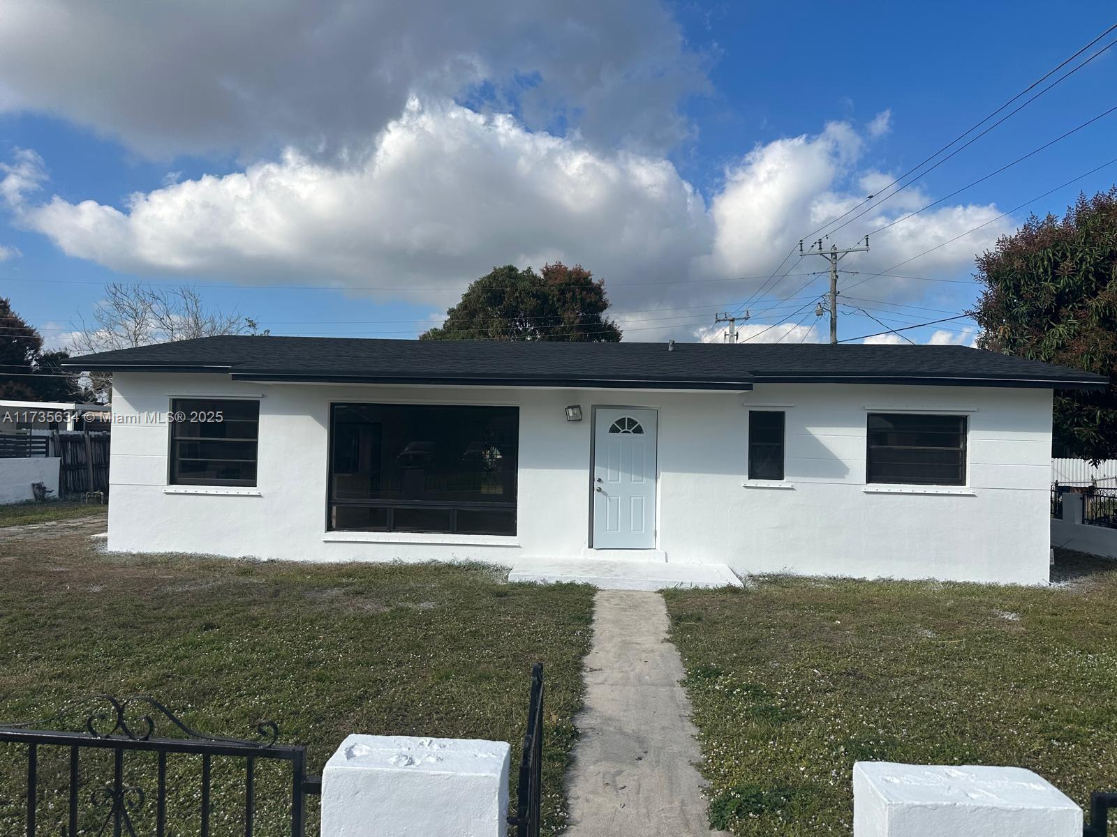 Amazing property for sale , completely updated  , from roof to floor . It has new air conditioning and the bathrooms and kitchen have been remodeled.The electric panel is brand new also.This house stands in a great location in a huge lot. Come to see it today, you won't regret it.
