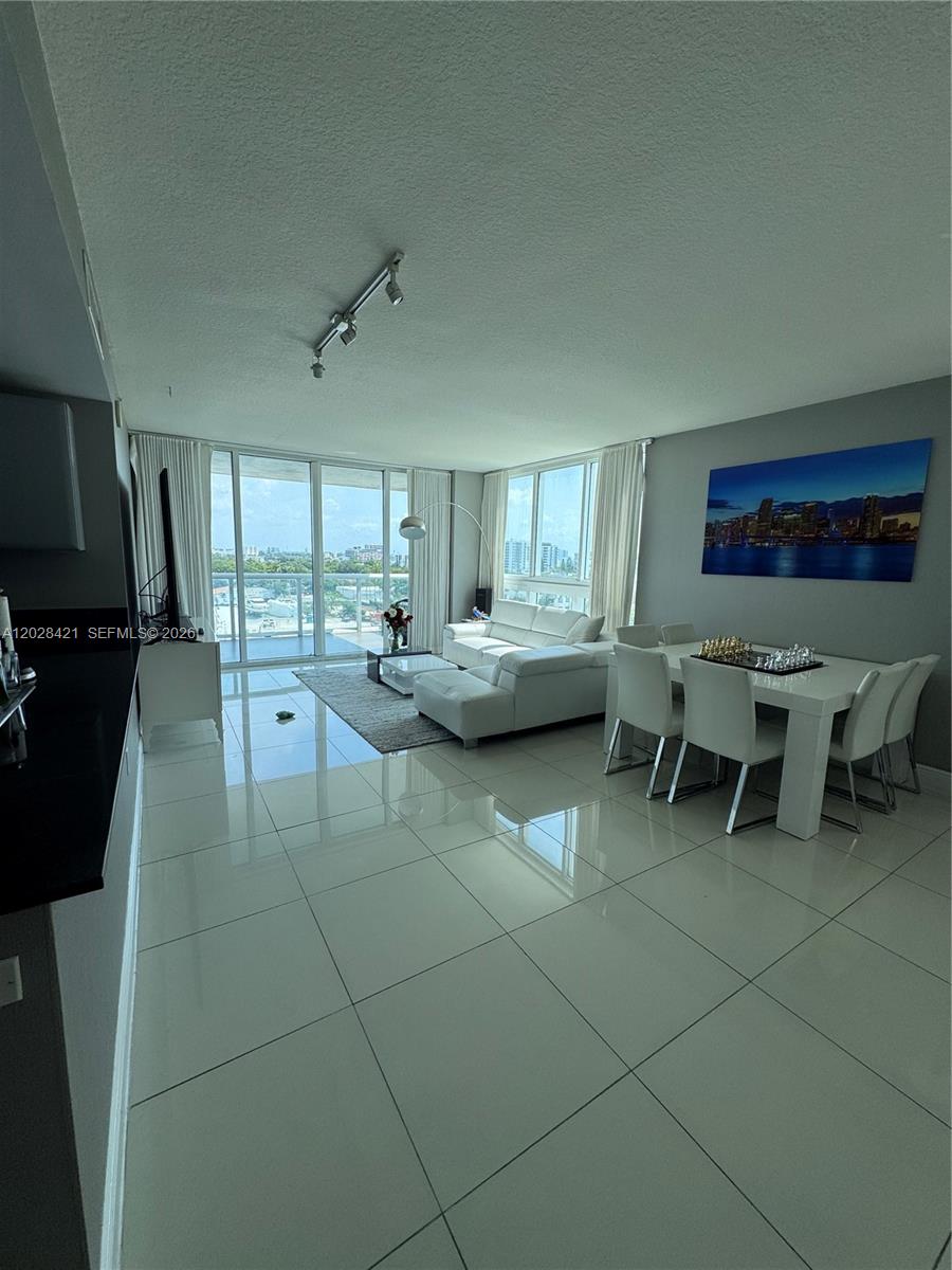 Rare opportunity to own a spacious 3-bedroom, 3-bath corner residence with 1,596 SF and captivating river views. Featuring floor-to-ceiling windows in the living room, this home offers an abundance of natural light and seamless indoor-outdoor ambiance. Ideal for both end users and investors seeking a prime waterfront lifestyle. Unit comes with 2 parking spaces and double Storage.