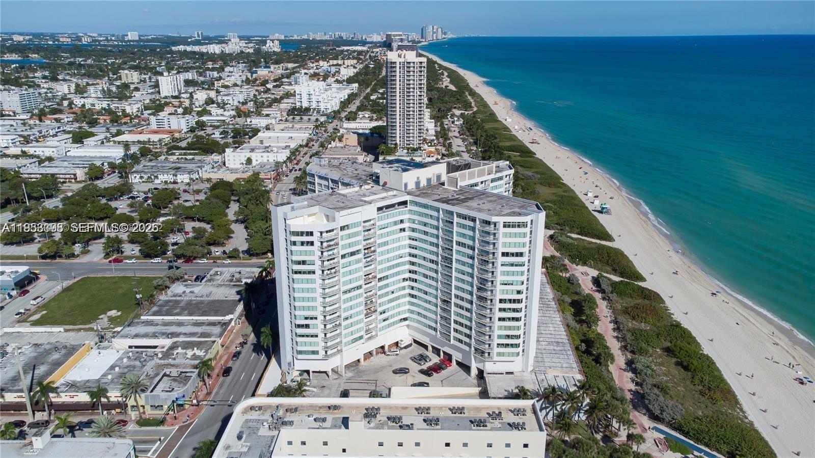 OCEAN VIEWS from every room! Spacious one-bedroom unit with two full bathrooms, plenty of closets, and extra storage on the same floor.  New A/C (July 2025) and Culligan water filtration system.  The building has undergone a 30-million-dollar restoration project:  concrete restoration and exterior painting, balconies and railings, impact windows and doors, garages, pool, deck, and much more.  Association dues include cable, internet, and pest control.  Amenities include a gym, game room, social room, 24-hour security, and assigned parking space.  For your convenience, washers and dryers on every floor.  The Burleigh House is located right on the beach for your enjoyment and close to parks, shops, and restaurants.  Ocean views, beautiful unit, amenities-filled building, and location!