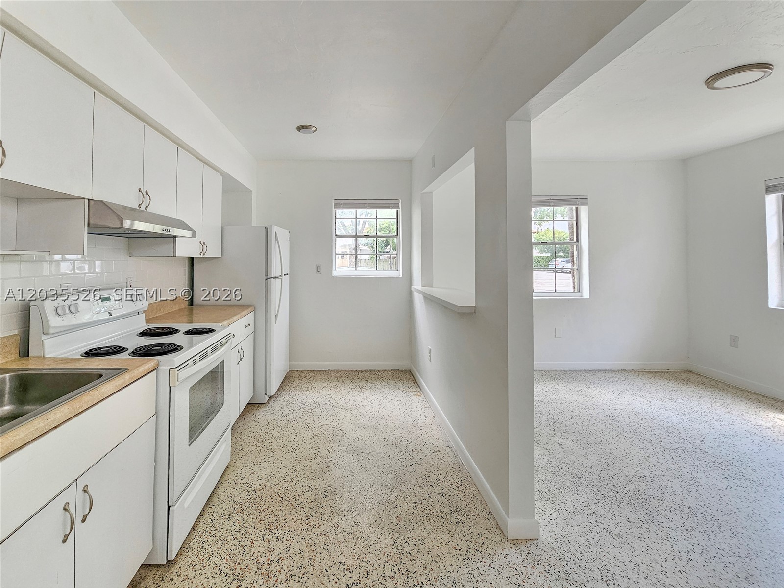 TAMIAMI LAWNS REVISED - Residential Lease