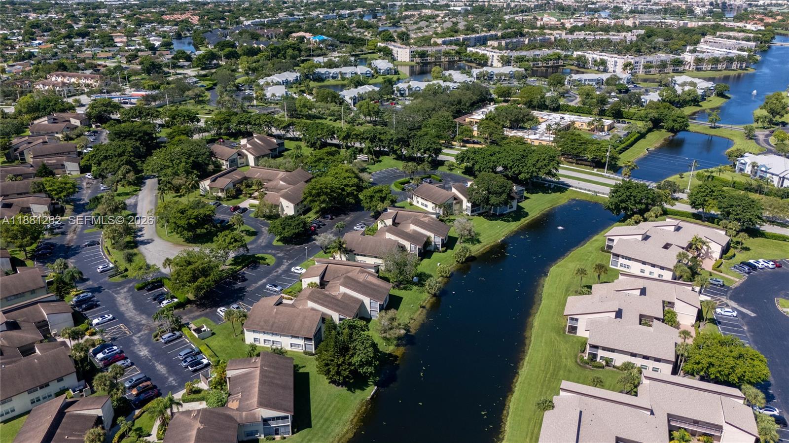 Bright and inviting 2-bedroom, 2-bath condo in the highly sought-after Tamarac community. Enjoy an open layout with abundant natural light, spacious living areas, and a first-floor entrance. Relax and unwind with serene lake views from your home. Tamarac offers a stable, well-maintained community with plenty of space to enjoy. Perfectly located in a desirable neighborhood, this condo combines comfort, convenience, and a peaceful setting. NO RESERVES. 
VACANT MOVE IN READY!!! The association requires Credit score 680