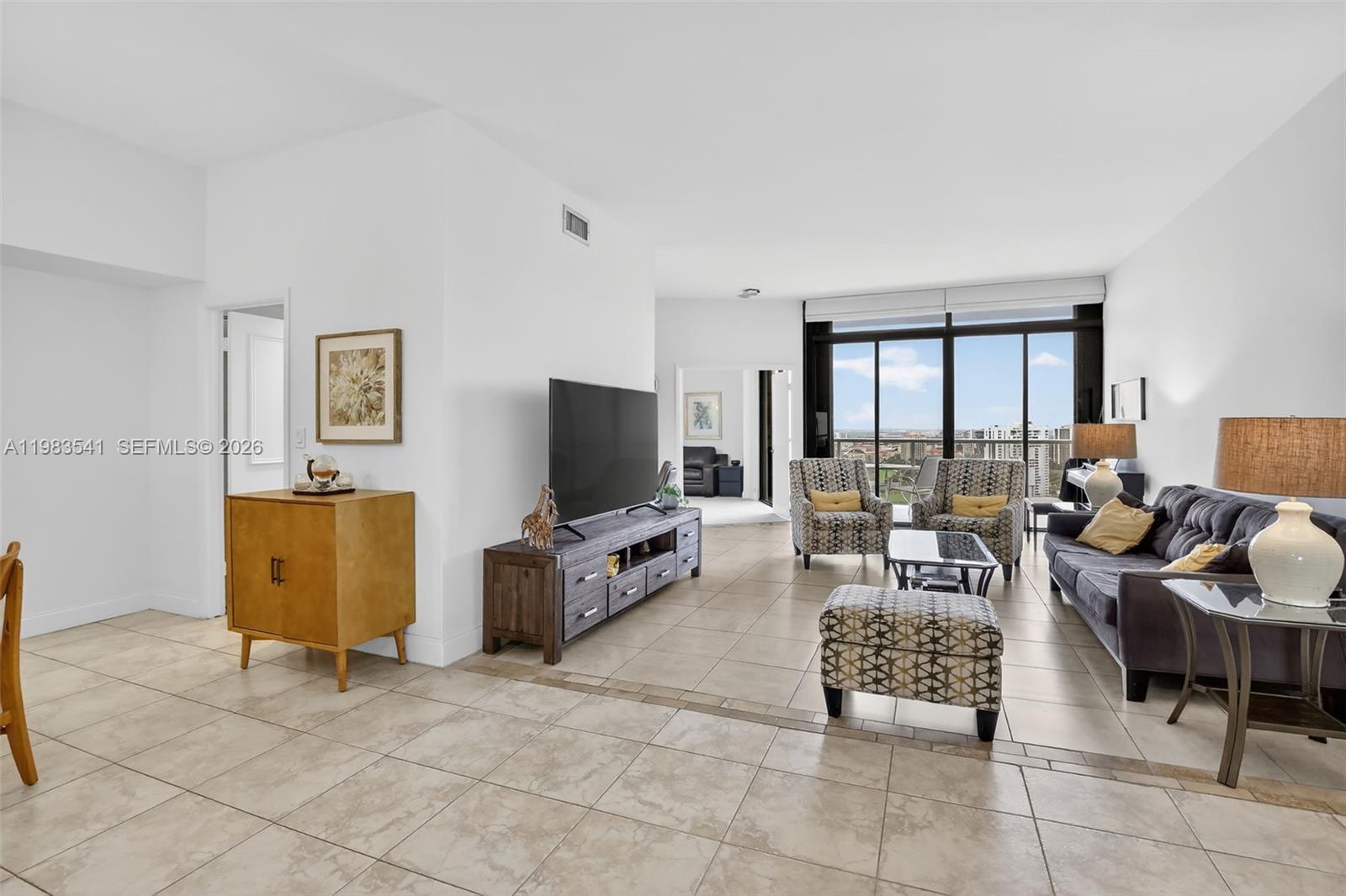WOW! SPECTACULAR TOWERSUITE RESIDENCE OFFERS HIGHER CEILINGS AND PANORAMIC VIEWS TO TAKE YOUR BREATH AWAY. SEE THE GOLF COURSE LAKE VIEWS, CITY + MORE. LARGE WRAPAROUND BALCONY. GREAT SPLIT BEDROOM FLOOR PLAN WITH OPEN KITCHEN. RESORT STYLE AMENITIES: POOL WITH HUGE DECK & BBQ, GYM, MEDIA RM, LIBRARY, EVENT ROOM, ENTER CLUB HOUSE TO THE HAMPTONS RESTAURANT, SECOND POOL ON THE INTRACOASTAL, NEW GYM, SPA, SAUNA, NAIL SALON, RACQUETBALL & TENNIS COURTS, KIDS ROOM, CARD RM, ROOM SERVICE, FULL MOVIE THEATER, ALSO CAFE WITH OUTDOOR SEATING! CLOSE TO AVENTURA MALL, RESTAURANTS, CASINOS, 5 MIN TO BEACH, NEAR 2 INT'L AIRPORTS. NEXT TO SOFFER EXERCISE TRAIL ON GOLF COURSE. SELLER PAID ALL ASSESSMENTS.