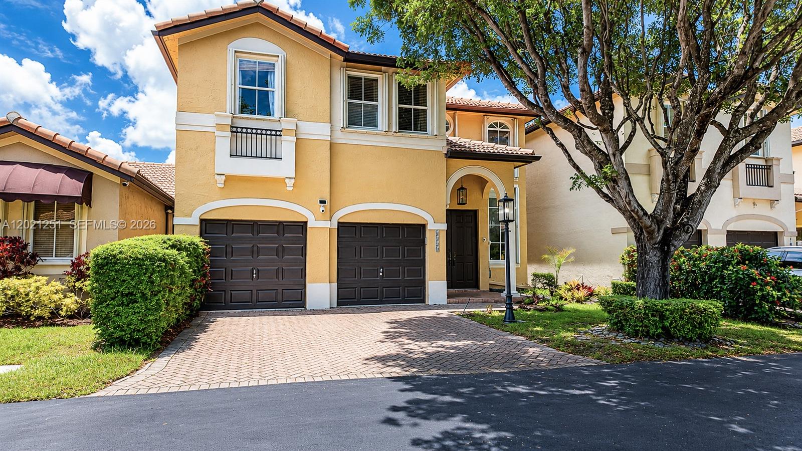 Live Limitlessly in this beautifully maintained townhome located within the quiet, gated community of Costa Bella at Doral. Featuring 4 bedrooms upstairs, 2.5 bathrooms, a 2-car garage, brand-new flooring, soaring vaulted ceilings, and a spacious layout designed for everyday living and entertaining. Enjoy a separate dining room, large eat-in kitchen overlooking the family room, and inviting living spaces throughout. The oversized primary suite is complemented by three additional bedrooms upstairs. Step outside to your private, lush backyard retreat with brick pavers and mature landscaping creating a peaceful escape. Complete with accordion hurricane shutters on all doors and windows and ideally located with easy access to the Turnpike, shopping, dining, and all that Doral has to offer.