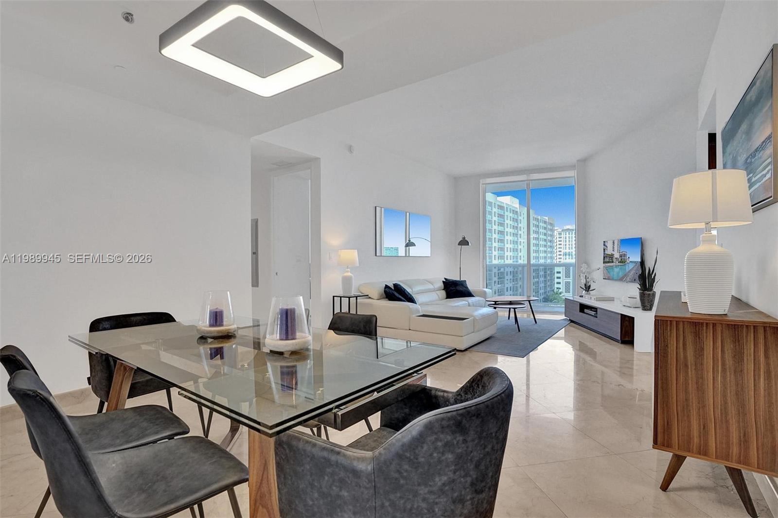 Experience oceanfront luxury in this fully furnished 2-bedroom, 2-bathroom residence at Trump Tower I. Located on the 8th floor, this elegant home offers beautiful Intracoastal views, private elevator entry, marble floors, and floor-to-ceiling windows that fill the space with natural light. The open-concept layout features a gourmet kitchen with wood cabinetry and stainless steel appliances, flowing seamlessly into the living and dining areas. A spacious balcony provides the perfect setting for relaxing or entertaining.

Residents enjoy resort-style amenities, including 24/7 concierge, valet, beachfront service, fitness center, spa, and pool, along with deeded beach access and covered parking. Ideally located in Sunny Isles Beach, just minutes from Bal Harbour and Aventura. Leasing is permitted up to four times per year with a three-month minimum. Master monthly payment: $728.51. Association fee: $1,131.74.