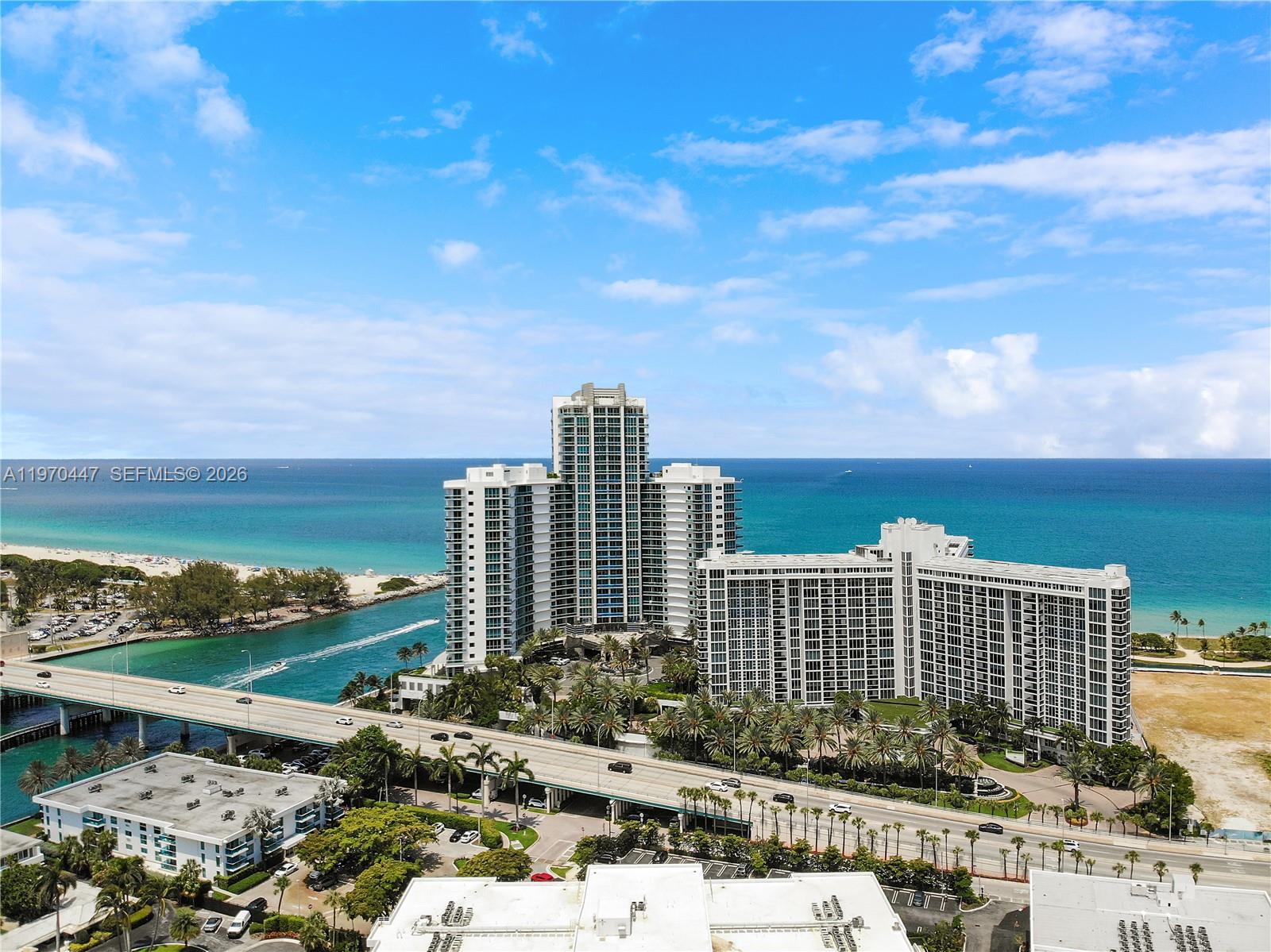 Experience luxury oceanfront living in this stylish studio in prestigious Bal Harbour with stunning ocean and bay views. Features open kitchen with paneled appliances and in-unit washer & dryer. Enjoy luxury amenities: pool with cabanas, jacuzzi, beach service with chairs and umbrellas, fitness center/spa with sauna and steam room. Residents also enjoy an on-site cafe, billiard room, BBQ area, sundeck, 24 hours security and valet parking. Water, cable, Wi-Fi and hot water included in maintenance. Just blocks from word-famous Bal Harbour Shops. Harbour House is next to Ritz Carlton Hotel.